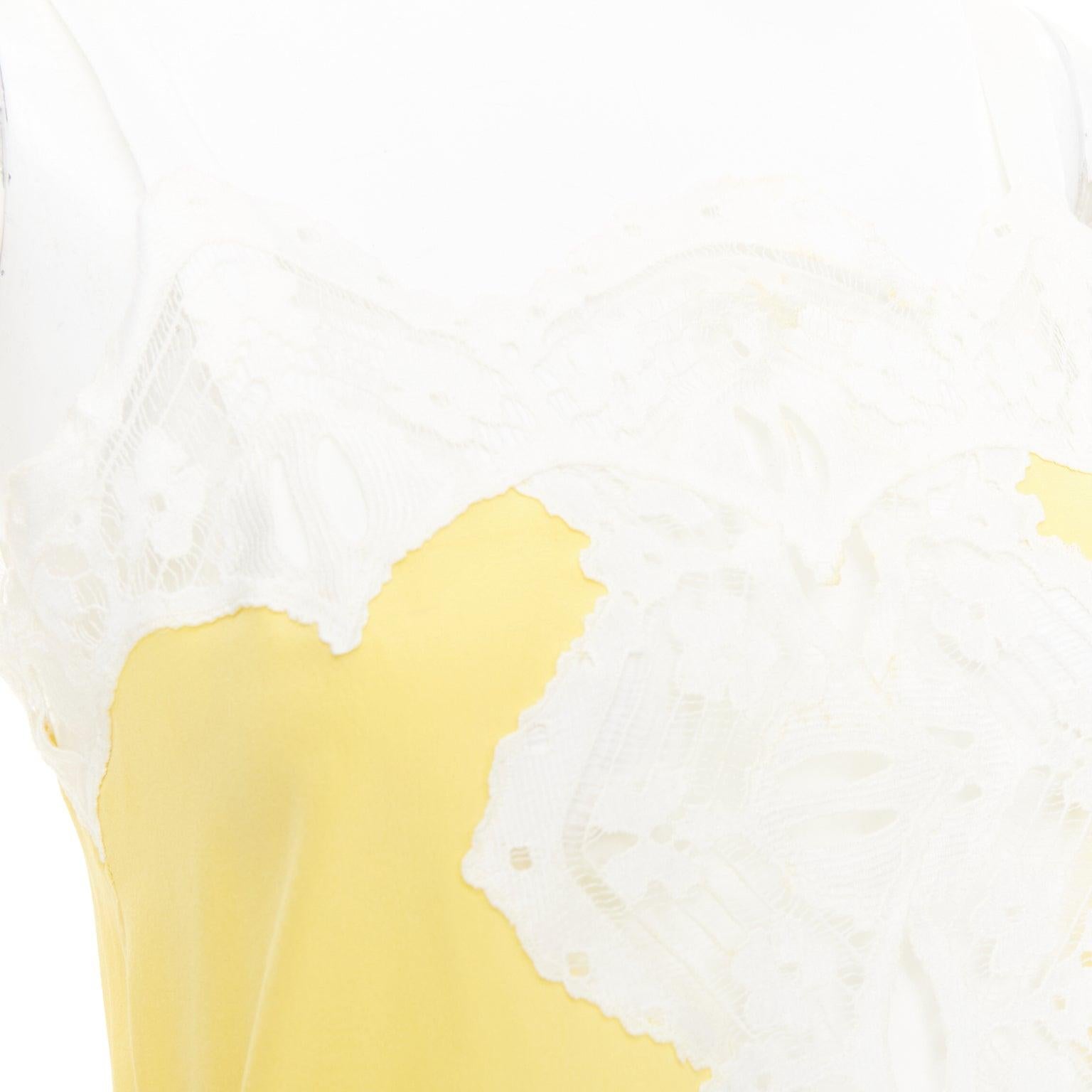 CHLOE yellow milk white 100% silk cotton blend lace trim camisole FR34 XS
Reference: CC/A00432
Brand: Chloe
Material: Silk, Cotton, Blend
Color: Yellow, White
Pattern: Lace
Closure: Slip On
Made in: Madagascar

CONDITION:
Condition: Poor, this item