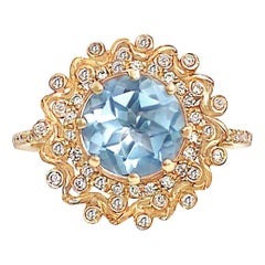 Chloris Double Halo Sky Blue Topaz and Diamond Ring 18 Karat