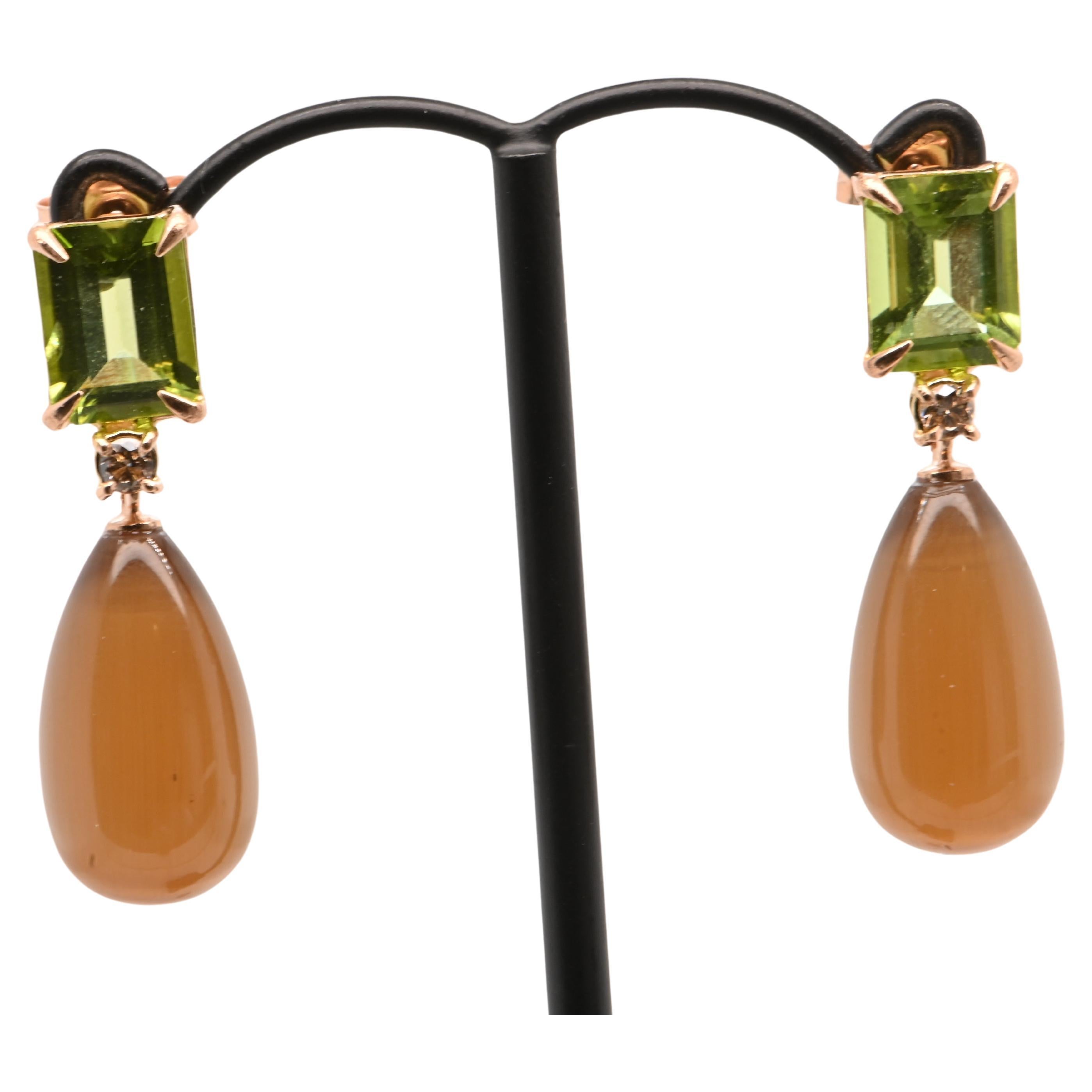 Choco Moonstone Peridoto Diamonds Rose Gold 18 Carats 

Discover Timeless Elegance with These Earrings: A Perfect Blend of Noble Materials and Carefully Selected Gemstones

- Main Material: 18-karat rose gold, offering a warm and refined glow.  
-
