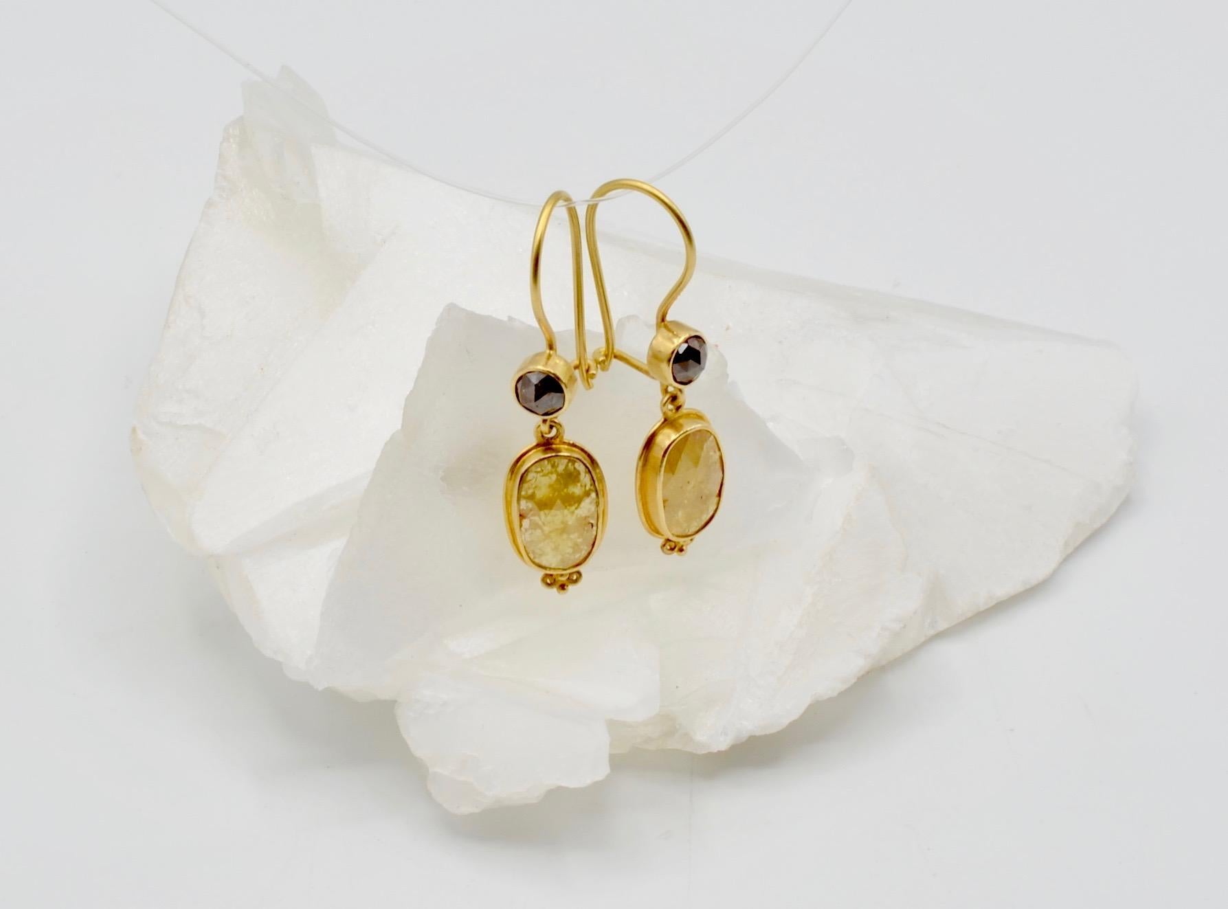 Diamonds come in all shades and colors. This pair Steven Battelle designed pair of earrings is a lovely combination of chocolate and deep yellow diamonds in a drop style that is timeless and classic. The total weight is 3.0 carats of dazzling