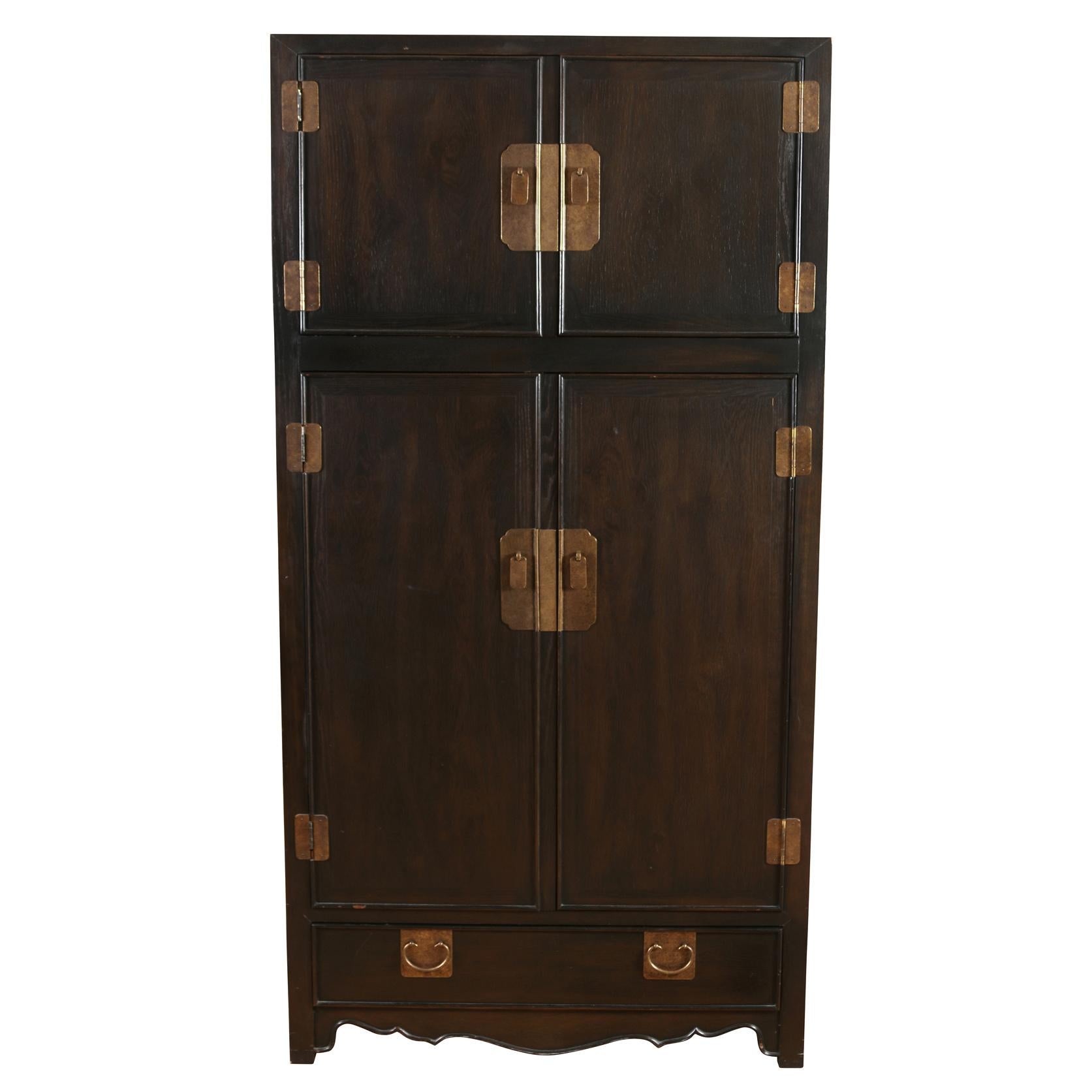 Chocolate Brown Asian Style Armoire with Brass Hardware In Good Condition For Sale In Locust Valley, NY