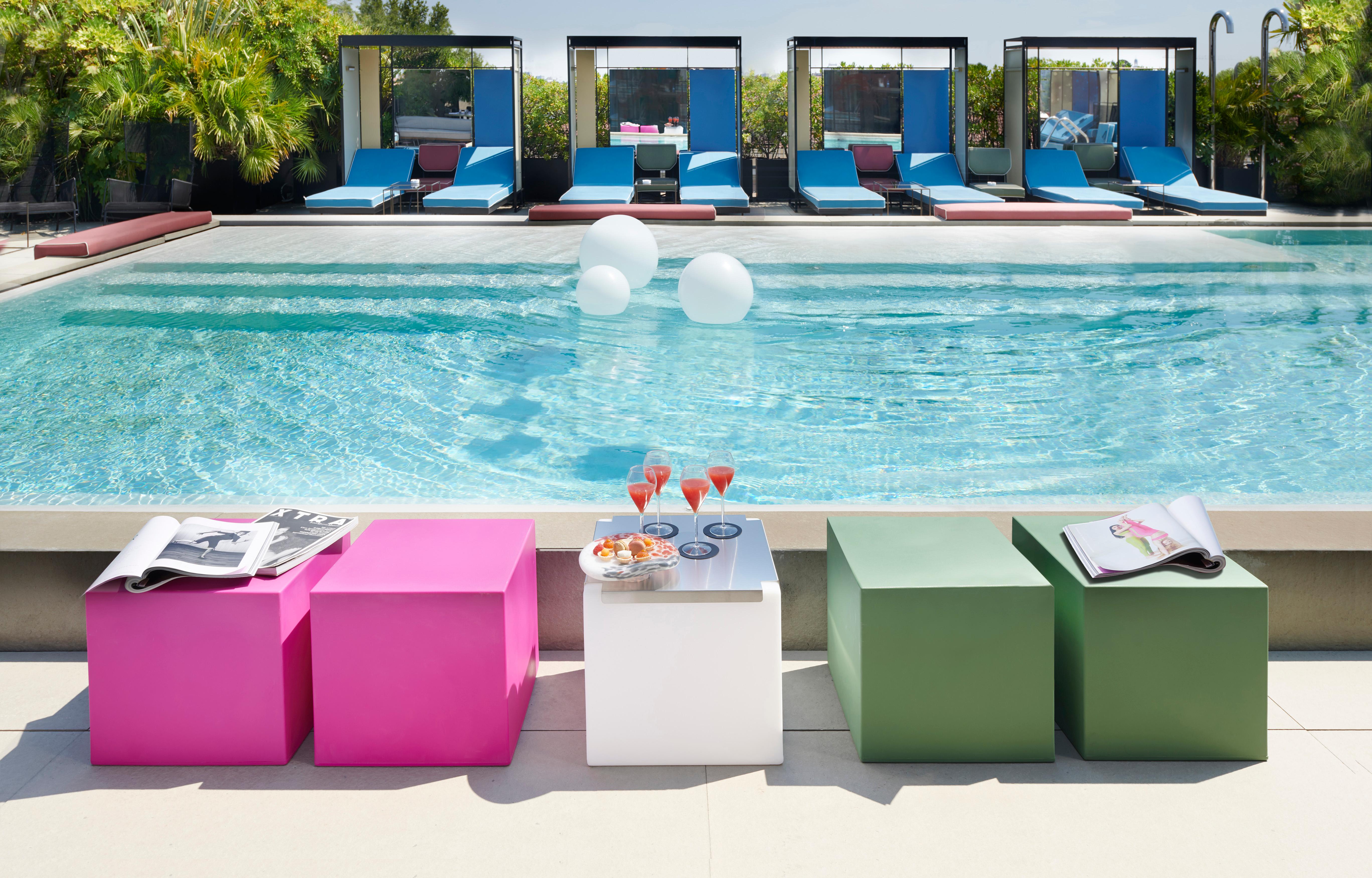 Chocolate Brown Cubo Pouf Stool by SLIDE Studio
Dimensions: D 43 x W 43 x H 43 cm. 
Materials: Polyethylene.
Weight: 4 kg.

Available in different color options. This product is suitable for indoor and outdoor use. Available in different versions: