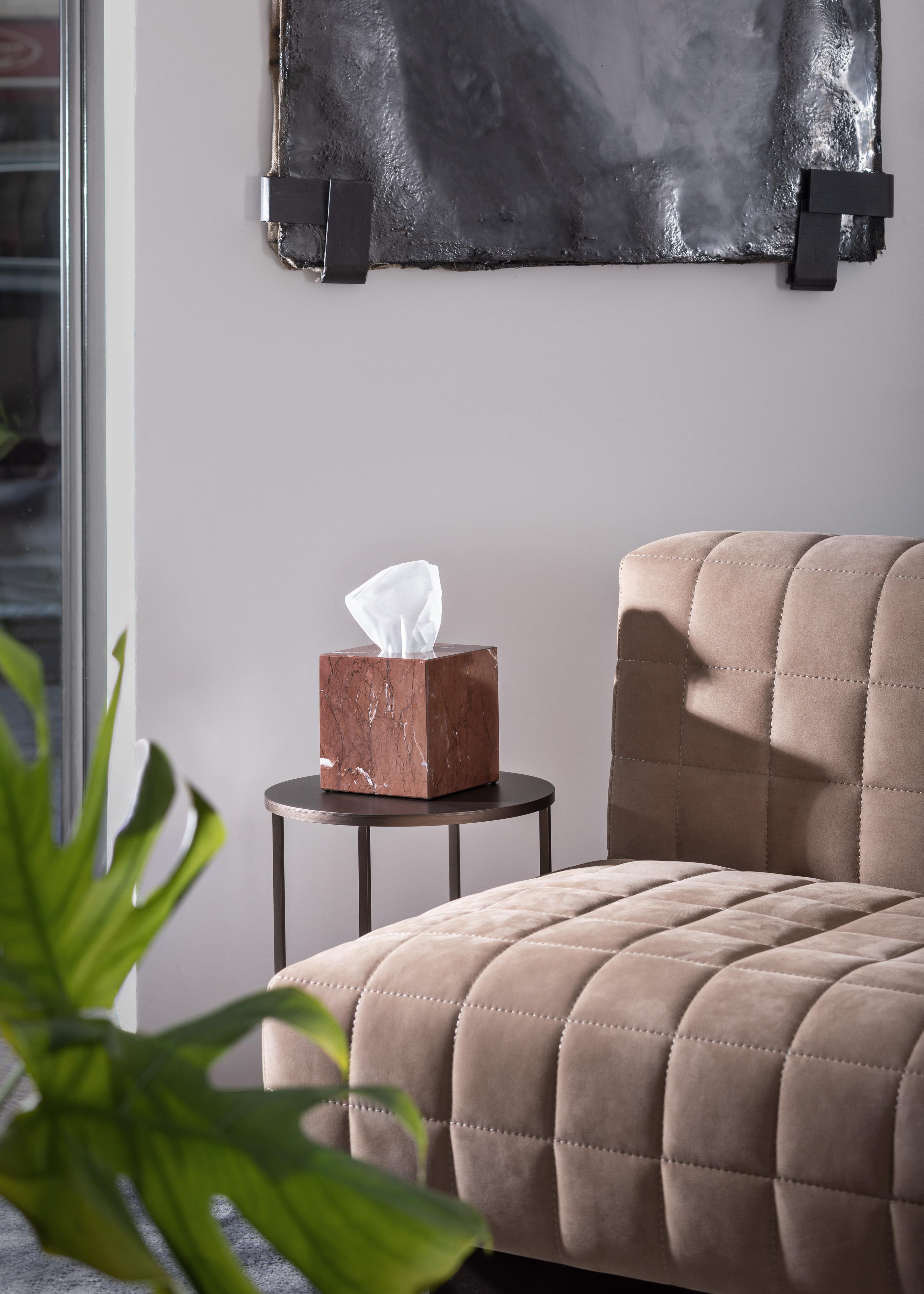Crafted entirely by hand, this marble tissue box cover is a fusion of form and function, seamlessly blending into any space while adding sophistication and elegance. Clean, minimalist lines highlight the natural veining of the marble, making each