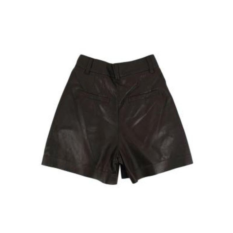 Brunello Cucinelli Chocolate brown pleat-front leather shorts
 

 - Supple, soft leather body
 - Lightly tailored, pleat front 
 - Zip fly
 - Inset hip pockets 
 - Fully lined
 

 Materials
 100% Leather
 Lining
 65% Acetate
 35% Polyester
 

 Made