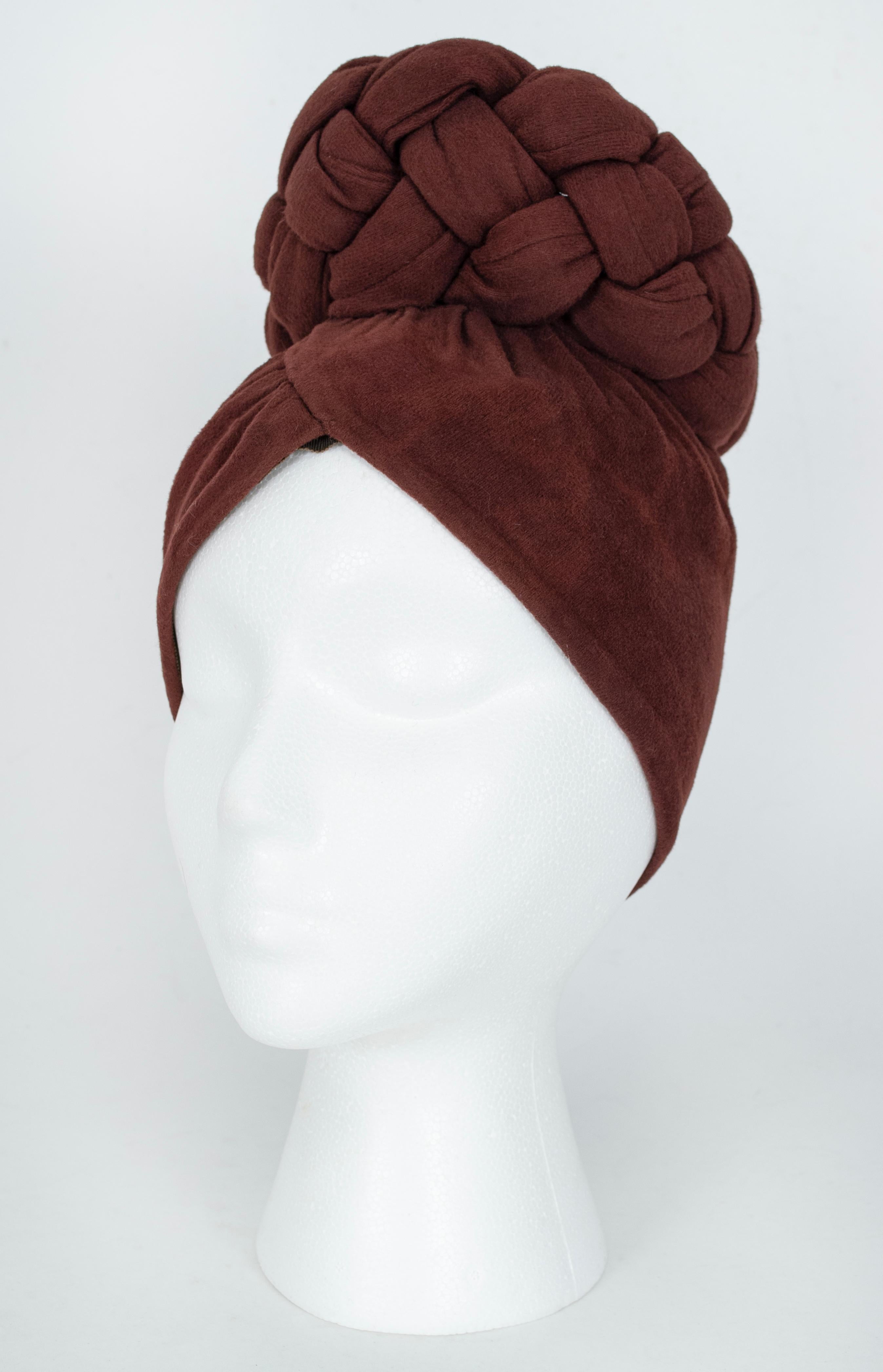 No ordinary turban, this model is a cross between Joan Crawford and Erykah Badu. It completely covers the skull, so bad hair days are conquered while drama and glamour are quite literally amplified.

Collapsible stretch fabric turban with surplice