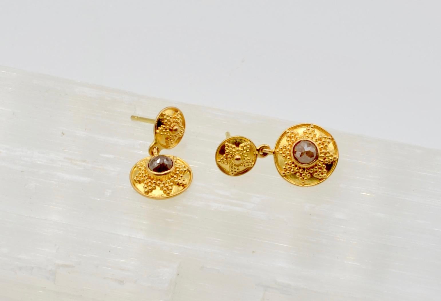 These Steven Battelle designed chocolate diamond earrings (1.1 carat  total weight ) set in 22 karat gold are the perfect combination of contrast and sparkle. The granulated Byzantine style is classic and perfect for the drop post design earrings.