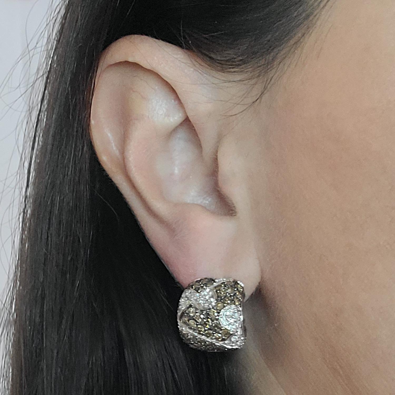 18 Karat White Gold Pave Huggie Earrings Featuring 82 Round Brown Diamonds and 68 White Diamonds of VS/SI Clarity Totaling Approximately 2.00 Carat. Pierced Post with Supportive Omega Clip Back and wrap Around Bottom; Post Removed Upon Request.