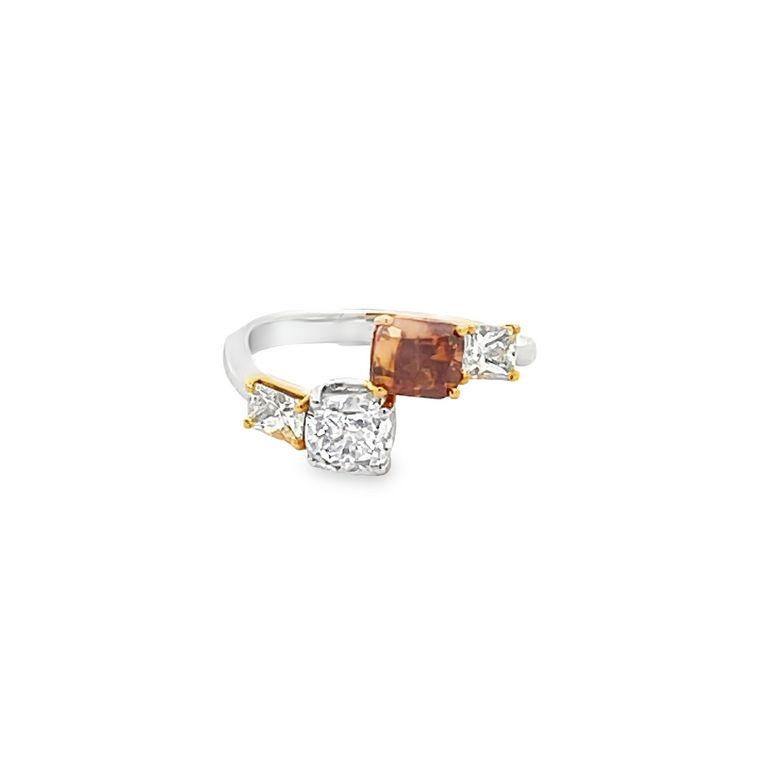 Introducing our stunning mix-shaped diamond fashion ring, expertly crafted to make a captivating statement. This gorgeous ring features two cushion-cut natural diamonds on the top, one in a fancy deep brown-orange color with a 1.01-carat weight.