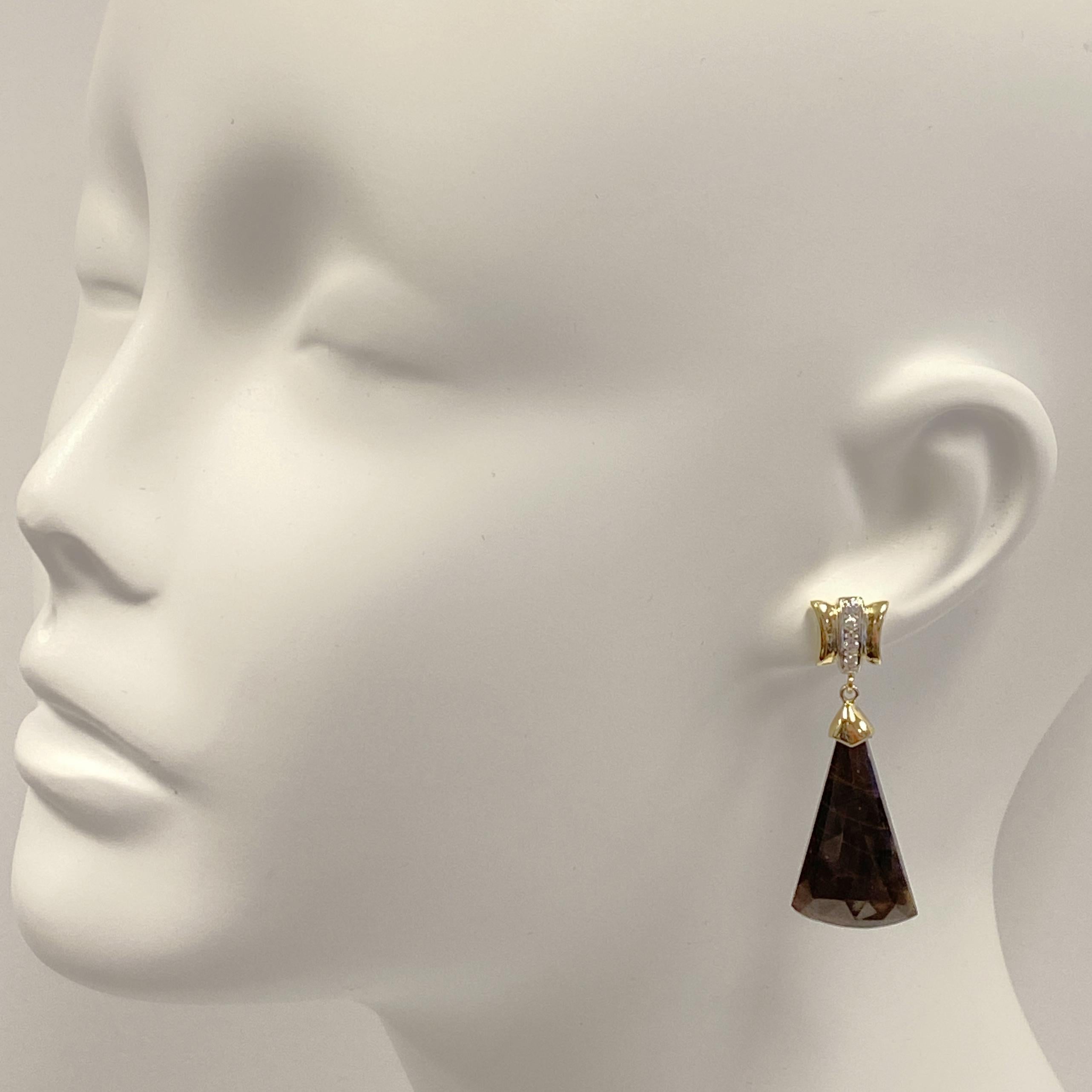 Eytan Brandes' new shimmery slice earrings feature natural brown sapphires and bright white diamonds in rich, unmistakable 18 karat gold.

The tops are actually left over links from an extremely expensive diamond bracelet Eytan shortened for a