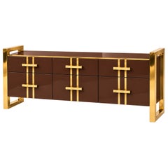 Chocolate Glass Sideboard with Brass Frames and Three Drawers