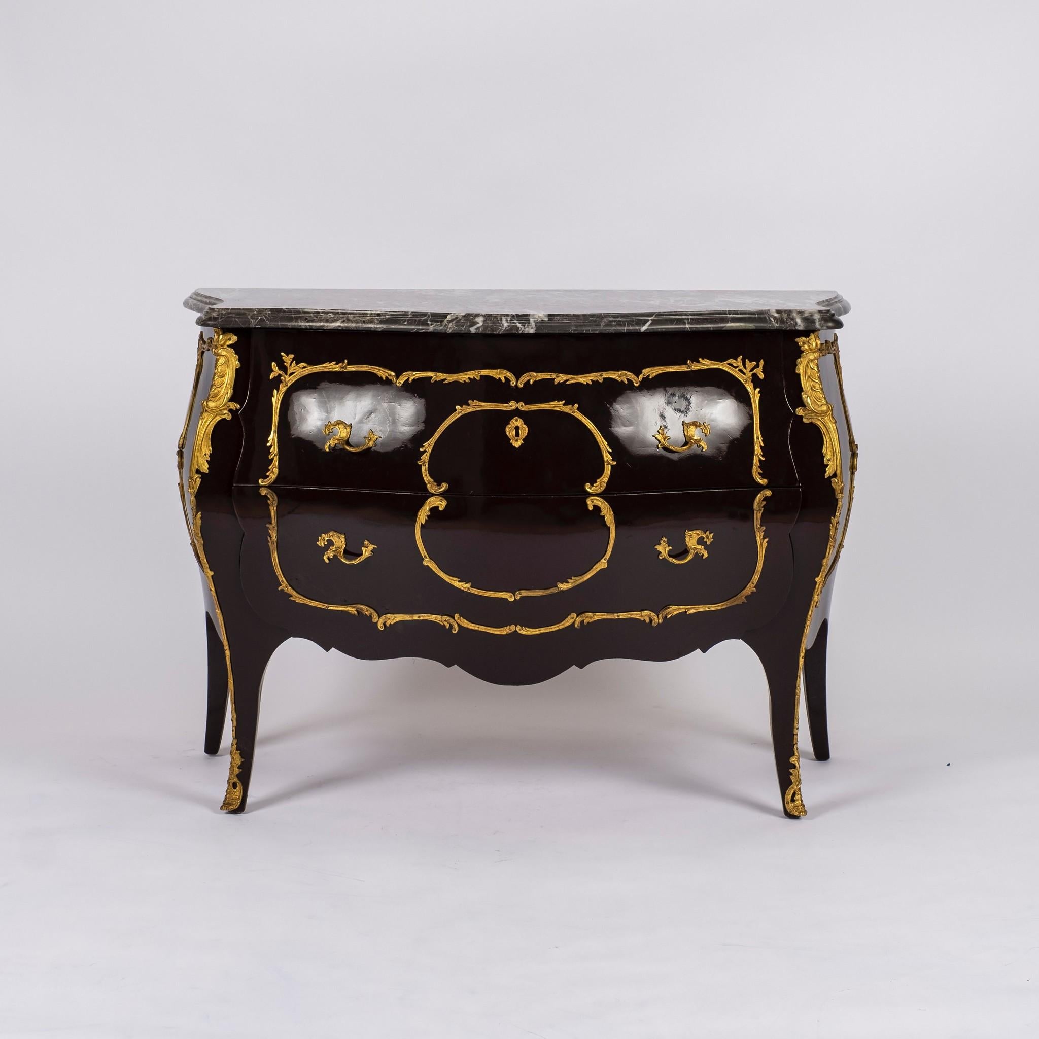 A vintage French Louis XV style commode newly painted in a super high gloss dark chocolate finish. This 