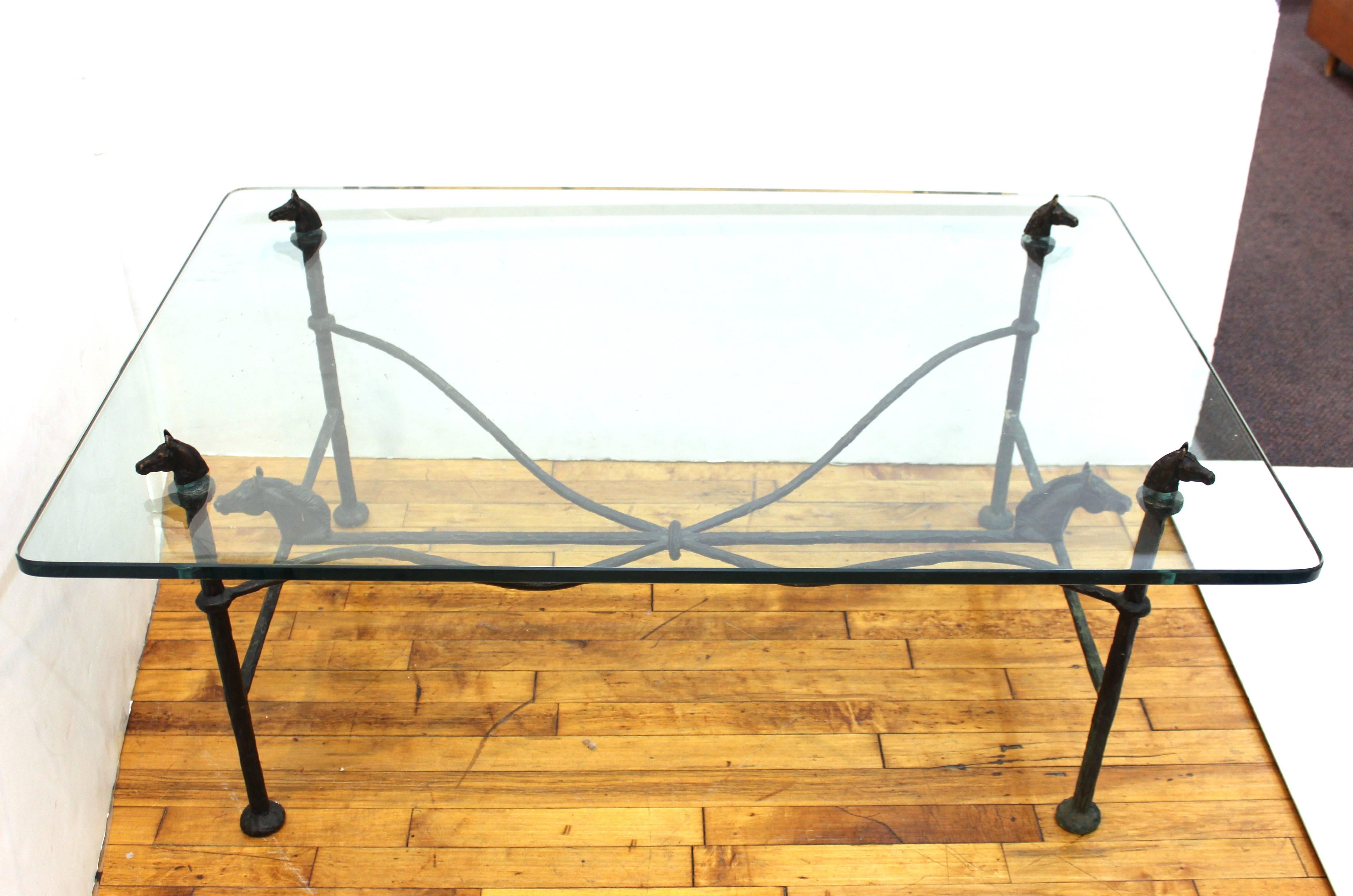 Christopher Chodoff Mid-Century Modern coffee or cocktail table in bronze, in Giacometti manner from the 1970s, with decorative horse heads. The piece is signed on the bottom of the bronze structure and is in great vintage condition.