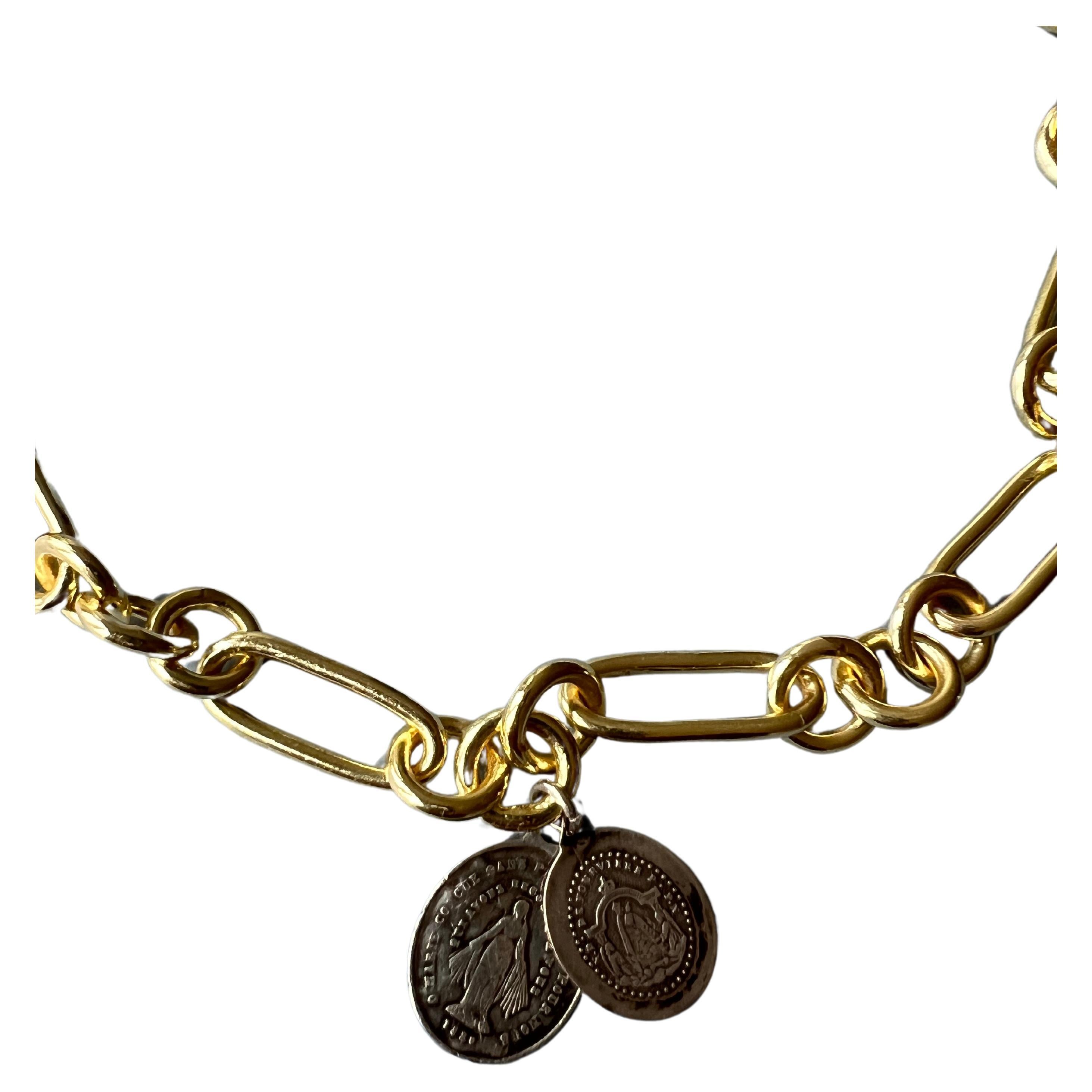 Chunky Chain Choker 14k Gold Plated Brass with two thin Vintage Virgin Mary's Medals in Silver

42 Cm

Designer: J DAUPHIN 

Available for immediate delivery 