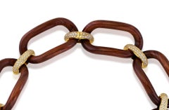 Gargantilla de madera y plata dorada con circonitas de cuatro eslabones - colección NOMAD *