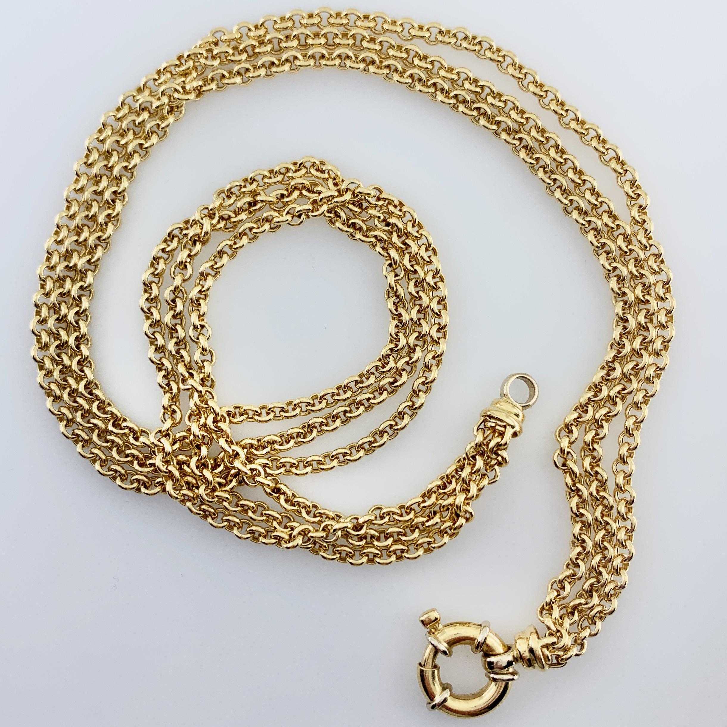 This great-looking workhorse has rounded rolo (aka belcher) links reminiscent of antique watch chains.  The three strands are equal in length and terminate with a chunky bolt ring closure that looks good enough to wear in the front.  It's a bit