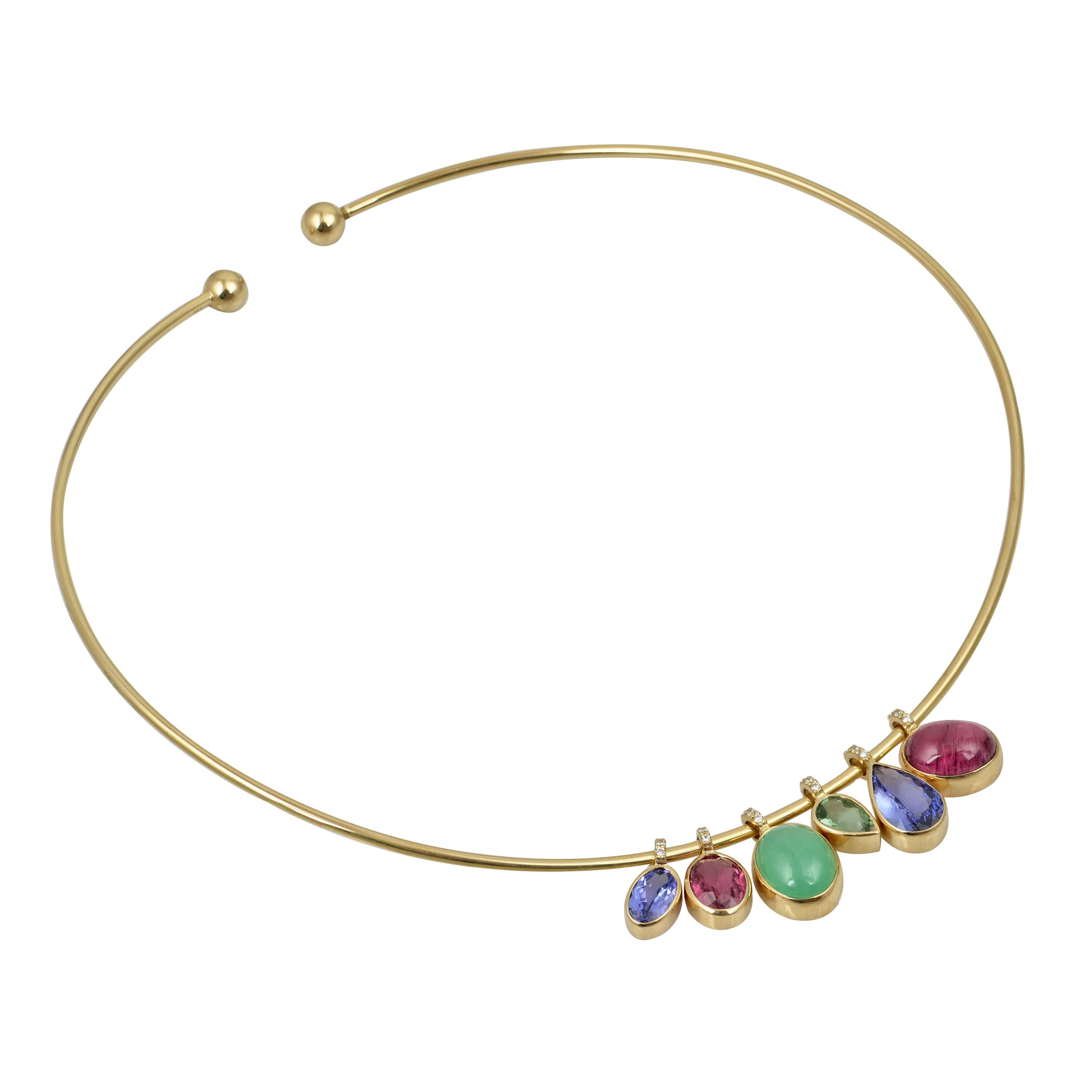 Designer: Alexia Gryllaki

Dimensions: central gem motif 52x12mm
Weight: approximately 27g
Barcode: ASR00011


A striking 18 karat yellow gold chocker necklace featuring a sleek wire design with a vibrant colored-stones motif for a dash of colr and