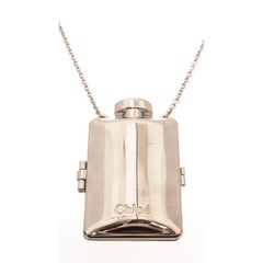 Chole Silver Ally Necklace with Silver-Tone Hardware and Turn Lock Closure