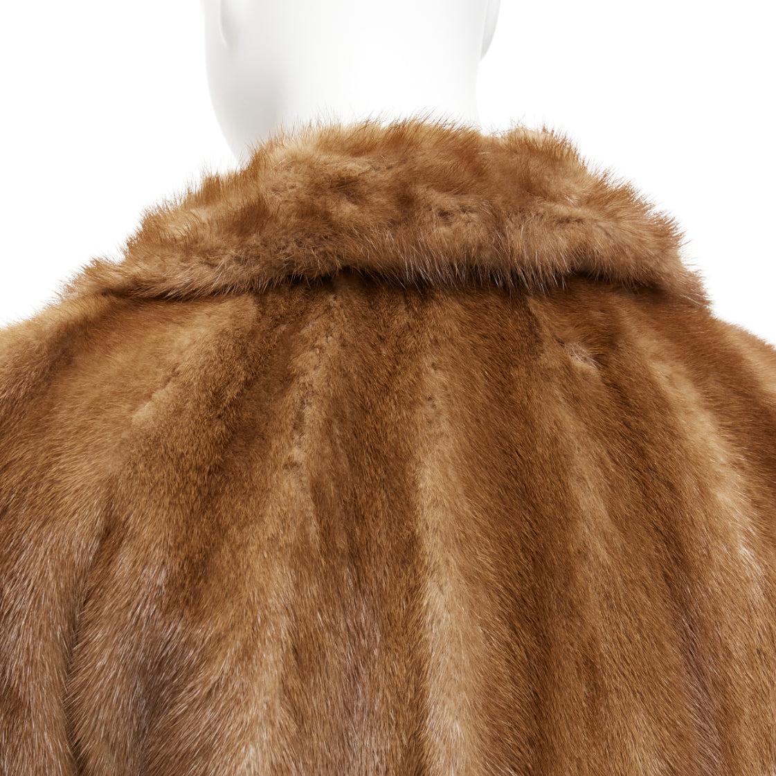 CHOMBERT brown genuine fur patched longline collared long sleeve coat
Reference: JACG/A00157
Brand: Chombert
Material: Fur
Color: Brown
Pattern: Solid
Closure: Button
Lining: Brown Fabric

CONDITION:
Condition: Very good, this item was pre-owned and