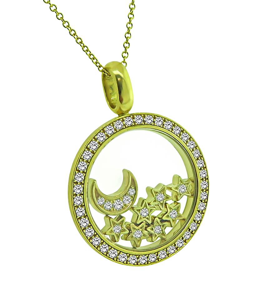 This is a stunning 18k yellow gold pendant necklace by Chopard. The pendant is set with sparkling round cut diamonds that weigh approximately 1.00ct. The color of these diamonds is E-F with VVS clarity. The pendant measures 30mm by 22mm. The chain