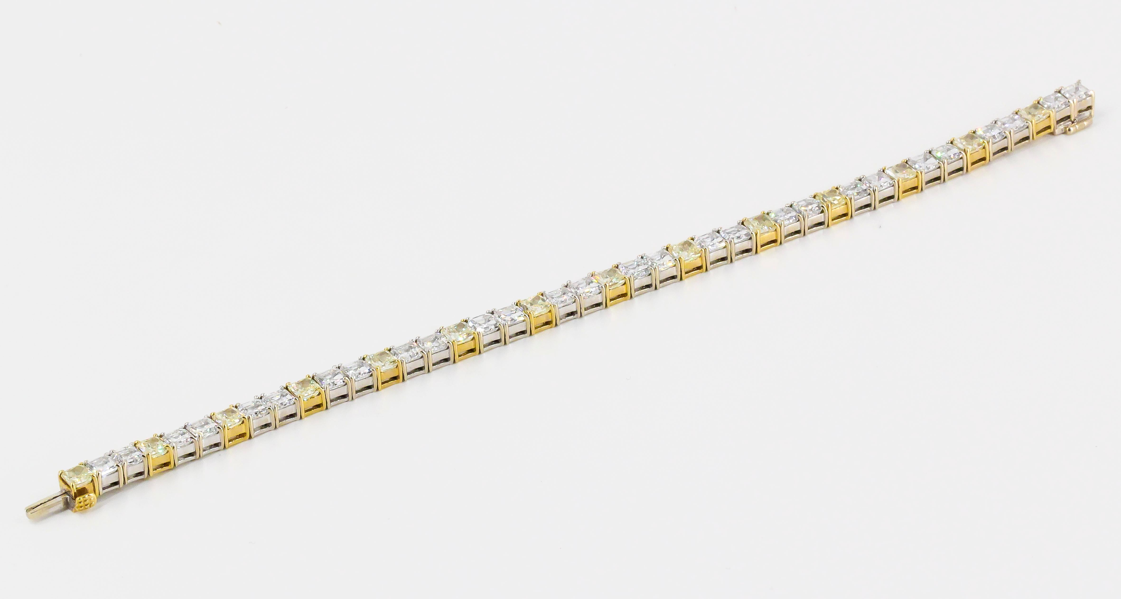 Elegant diamond and 18K white and yellow gold line bracelet by Chopard. It features high grade asscher cut white diamonds and radiant cut fancy yellow diamonds for a total weight of 16.1 cts.

Hallmarks: Chopard, reference numbers, 16.10.