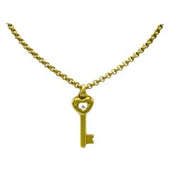 Chopard 18 Carat Yellow Gold Necklace with Diamond Key Pendant