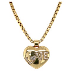 Collana con ciondolo a cuore Happy Diamonds in oro e diamanti di Chopard 18 carati
