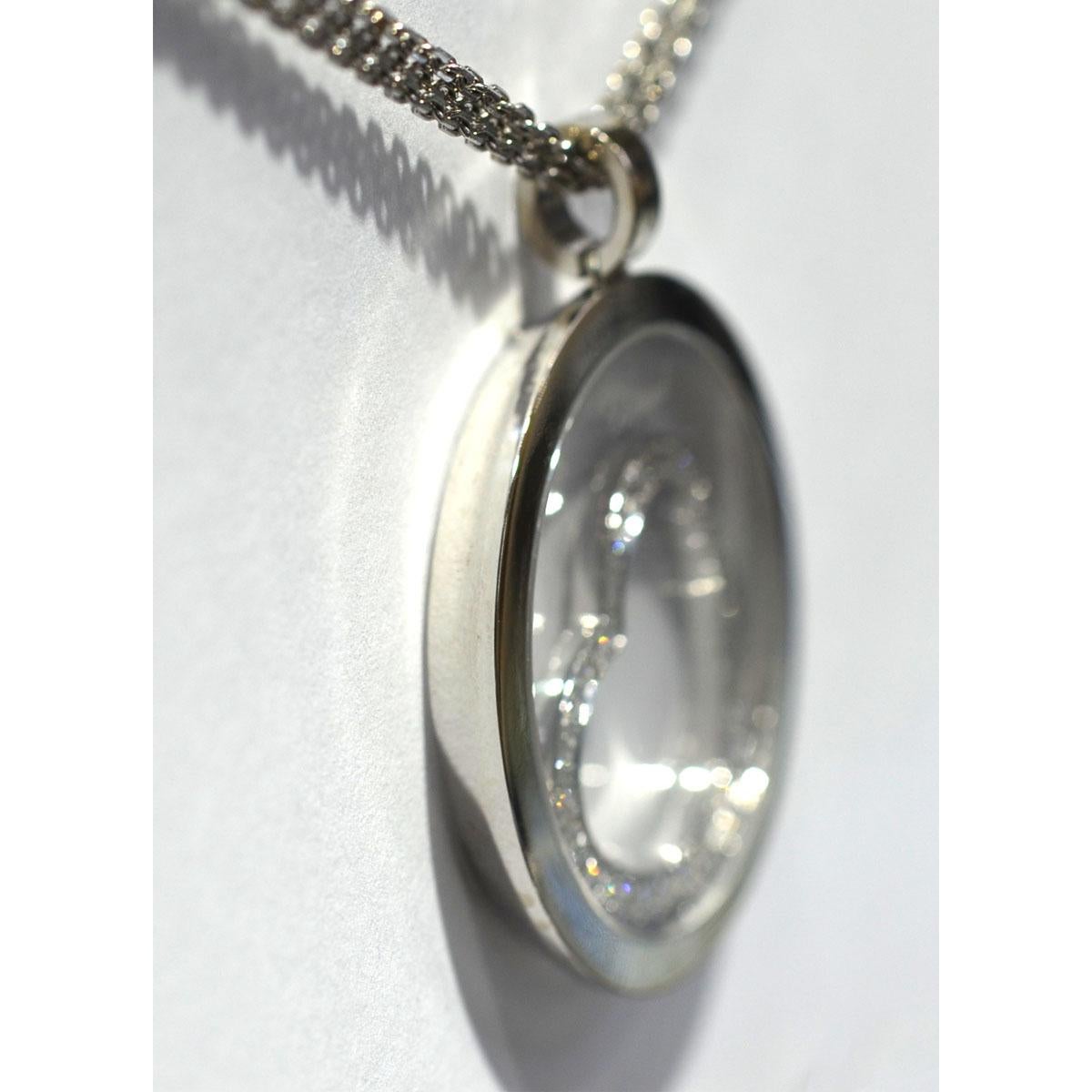 Company-Chopard 
Style-Floating Diamond Heart Pendant Necklace
Model-Happy Spirit 
Metal -18k White Gold Pendant W .93