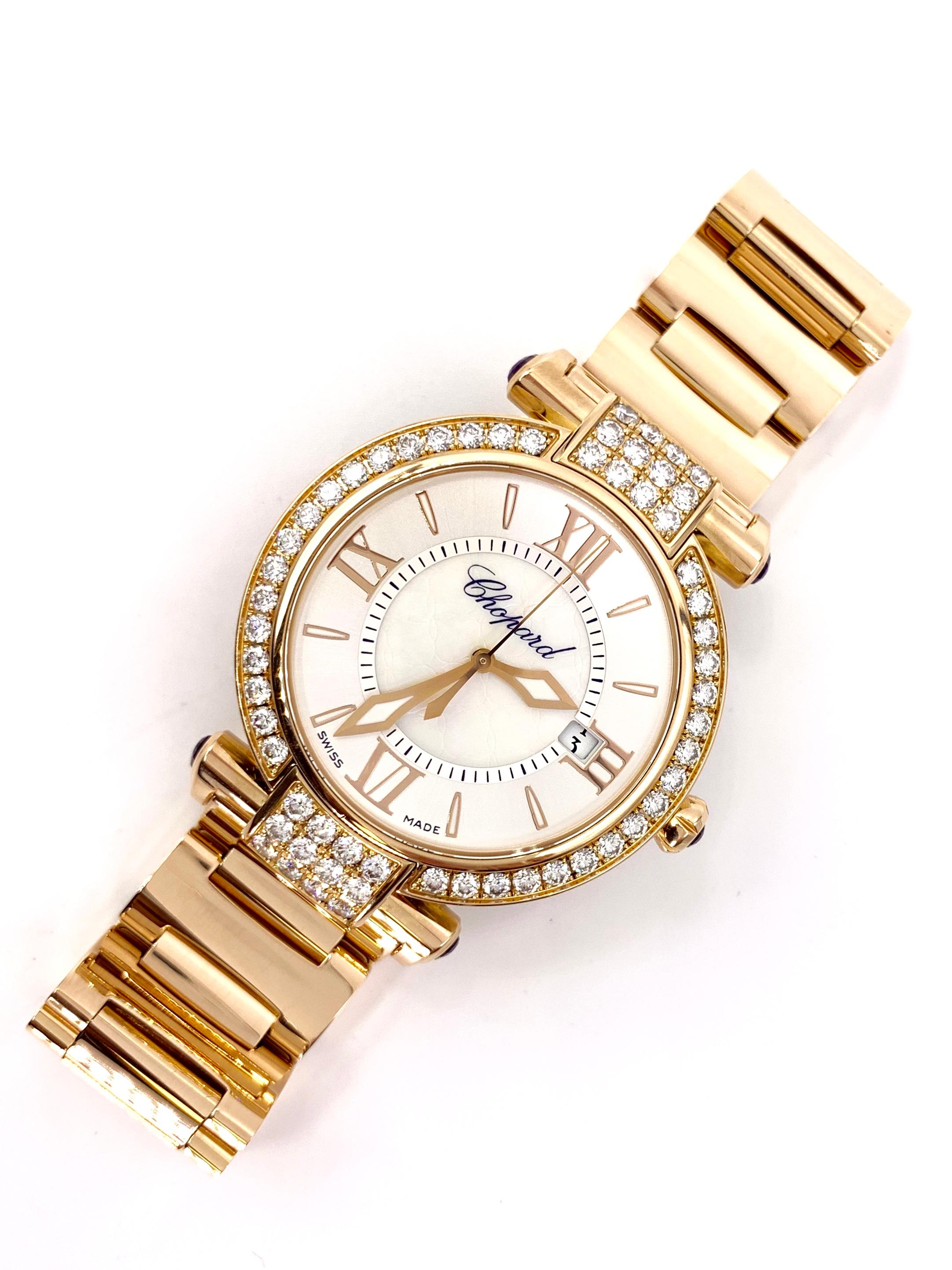 Gorgeous solid 18 karat rose gold Chopard Imperiale quartz watch featuring round brilliant diamonds and amethyst gemstones. Watch will arrive with original paperwork and original boxes. Current retail: $43,400
Watch Specifications:
Model: 750/000