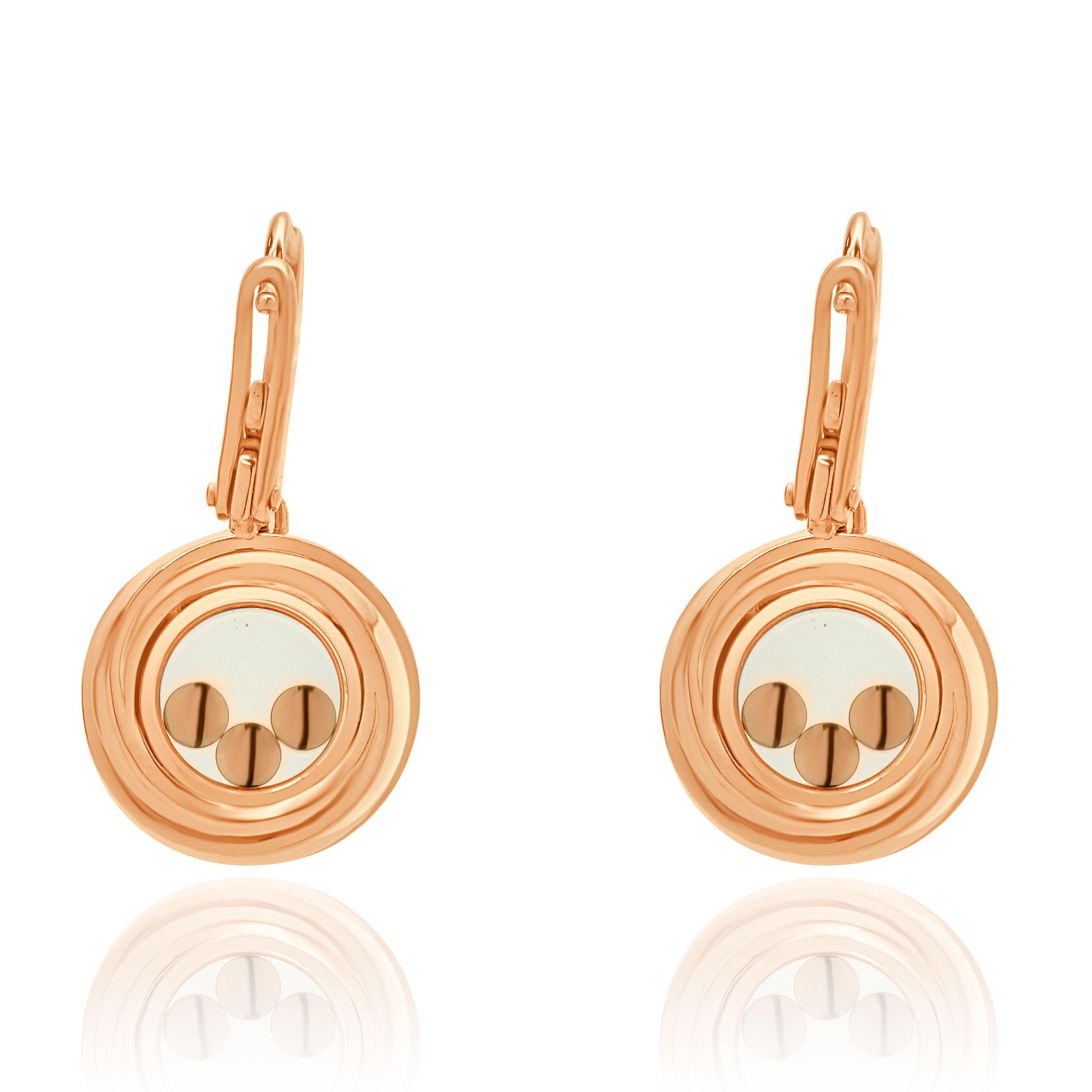 Designer: Chopard
Materiale: oro rosa 18 carati 
Diamante: taglio rotondo brillante = 0,30cttw
Colore: F
Chiarezza: VS2
Dimensioni: gli orecchini misurano 26 mm di lunghezza
Peso: 11,10 grammi
