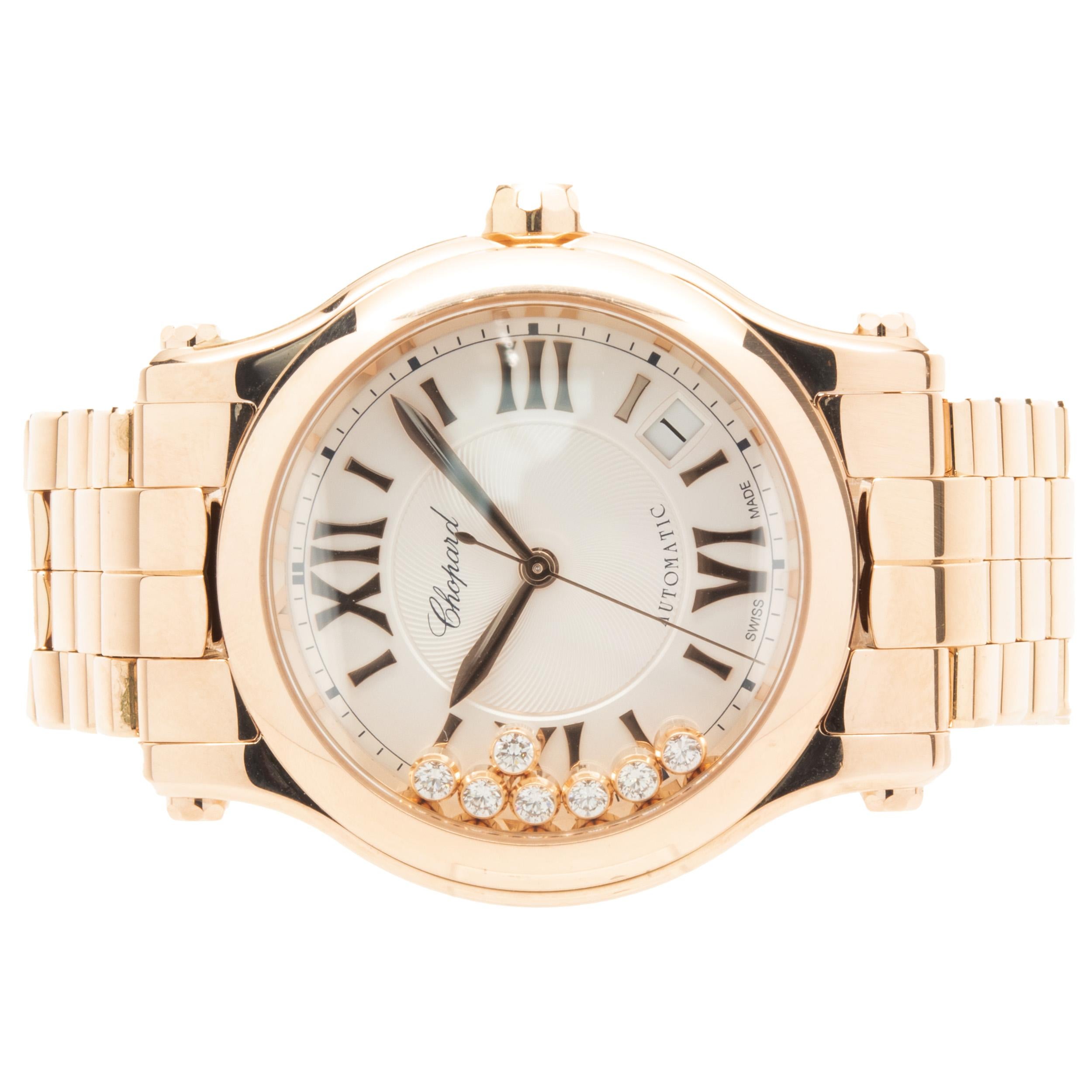 Movement: automatic
Function: hours, minutes, seconds, date
Case: 36mm round, push pull crown, smooth bezel
Band: Chopard 18K rose gold bracelet, integrated clasp
Dial: roman, floating 7 diamond
Reference #: 277472-5002
Serial: 1892XXX

No box or