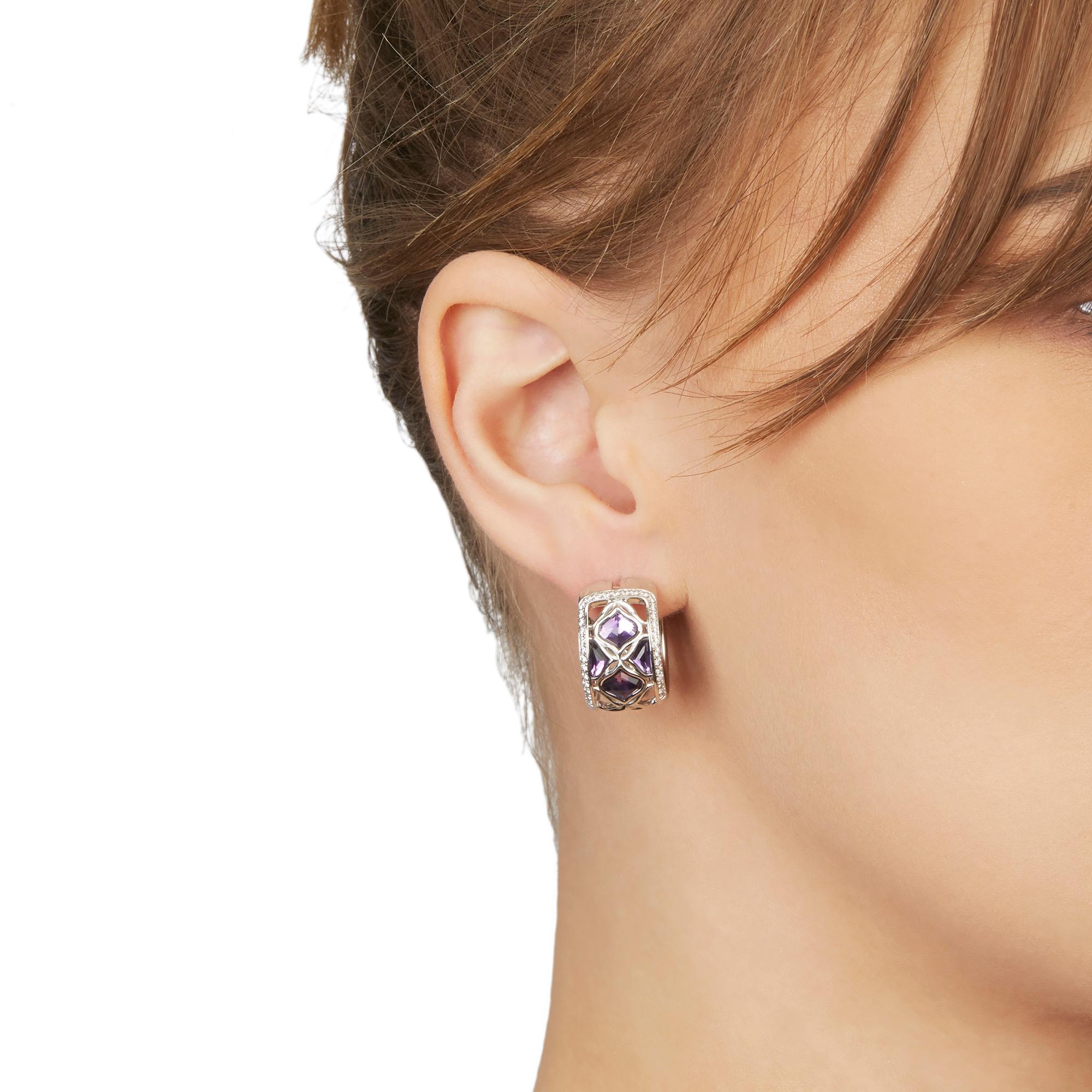 These Earrings by Chopard are from their Imperiale collection and feature 8 Amethysts and 66 round brilliant cut Diamonds of 0.45ct total colour G, clarity VS, made in 18k White Gold. These Earrings have secure latch backs. Complete with Xupes