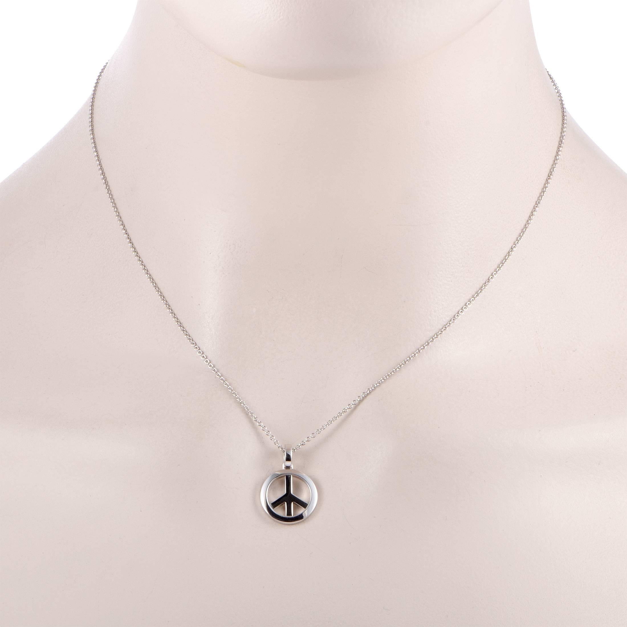 Accentuate your style in a captivatingly bold manner with this exquisite necklace that depicts one of the most recognized symbols. The necklace is presented by Chopard and it is beautifully crafted from elegantly gleaming 18K white gold. The