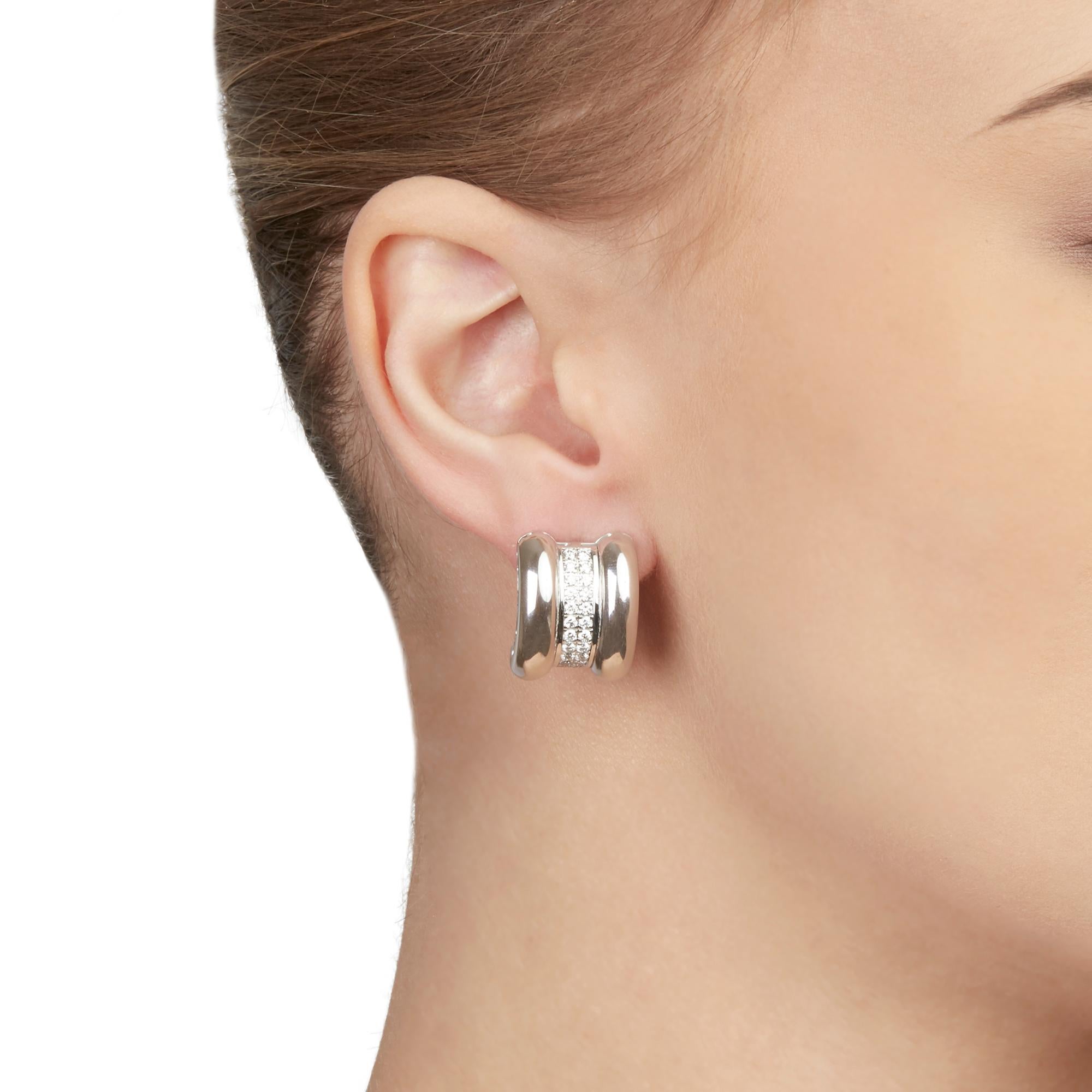 These Earrings by Chopard are from their La Strada collection and feature 44 round brilliant cut Diamonds of 0.92ct total colour G, clarity VS, made in 18k White Gold. These Earrings have secure omega backs. Complete with Chopard Box, Manuals &