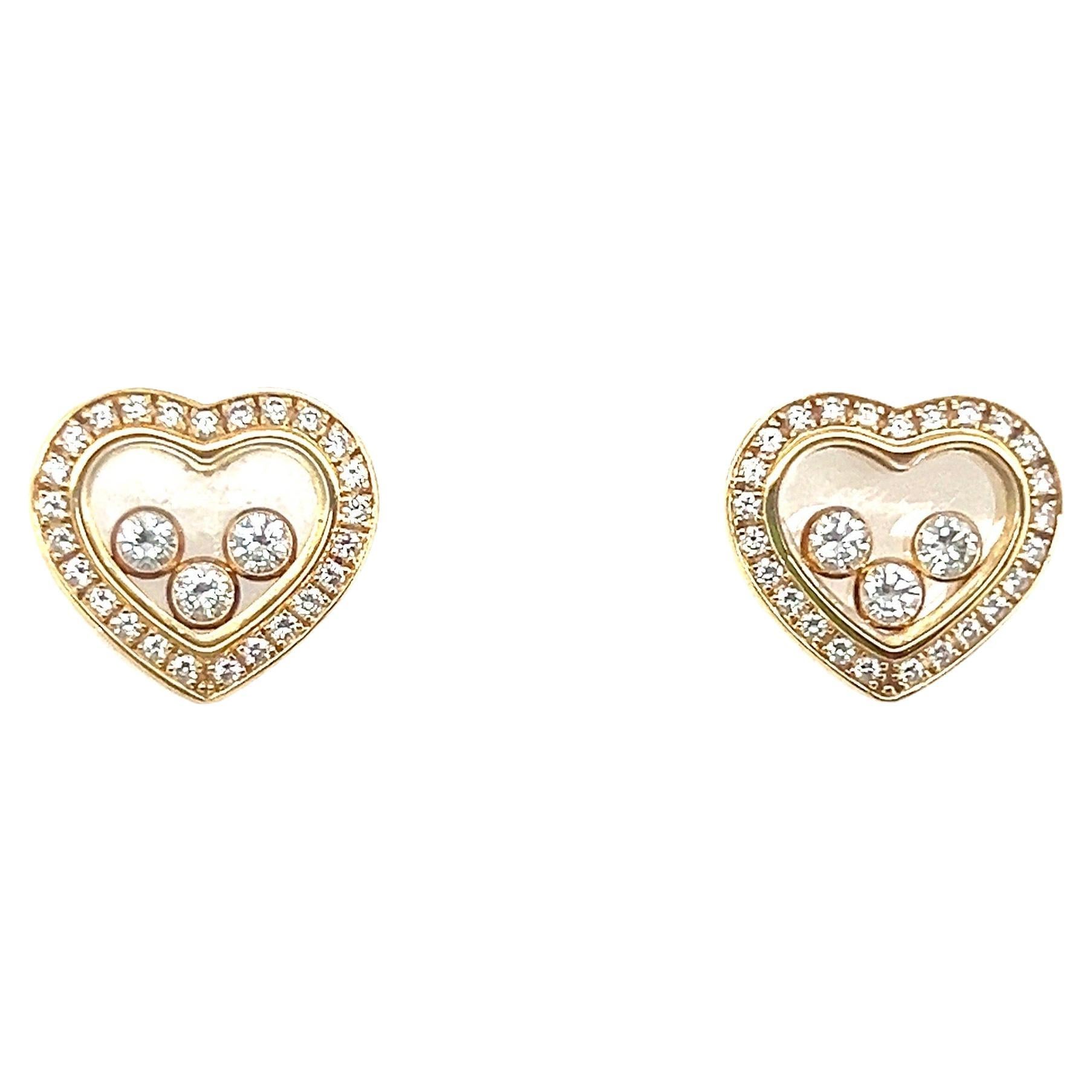 Decorative pair of 18 karat yellow gold 