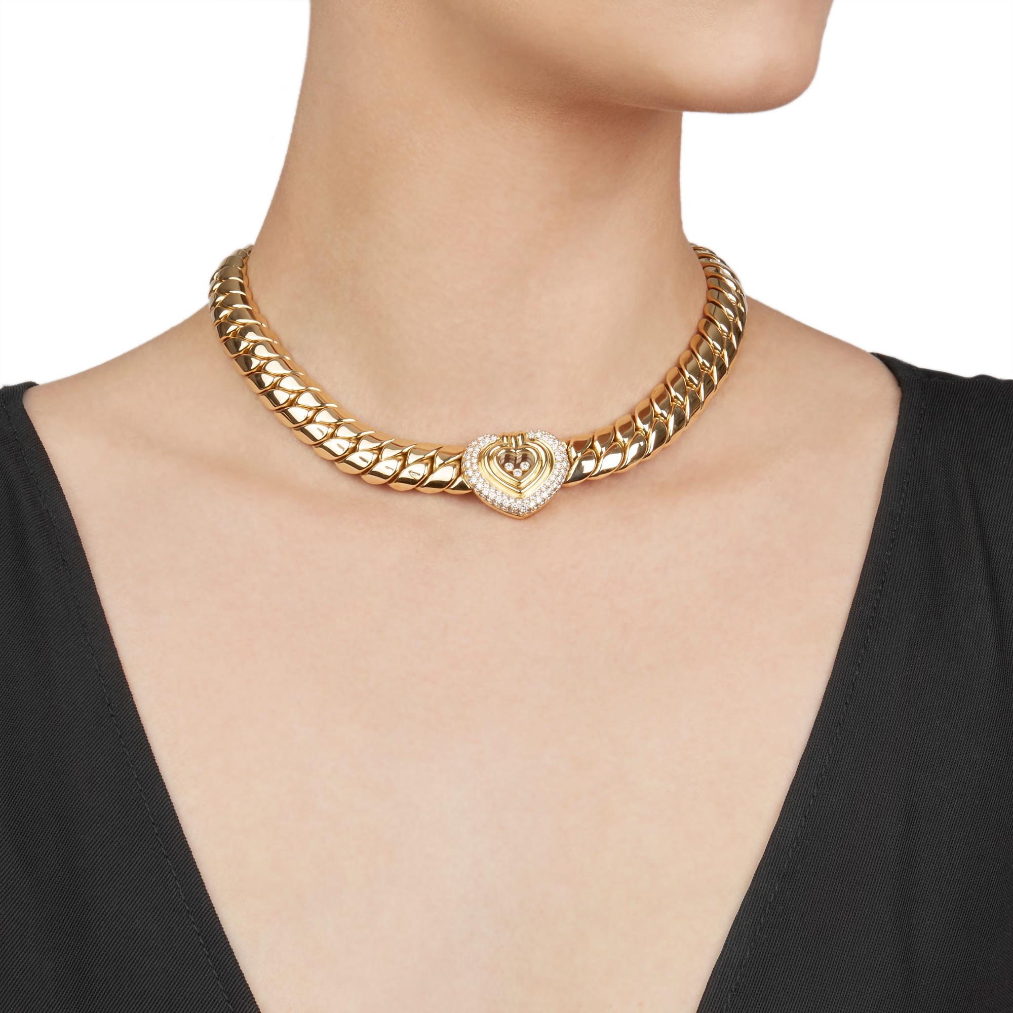 Code: COM2142
Brand: Chopard
Description: 18k Yellow Gold Happy Diamonds Necklace
Accompanied With: Presentation Box
Gender: Ladies
Necklace Length: 40cm
Necklace Width: 1.3cm
Pendant Length: 2.3cm
Pendant Width: 2.7cm
Clasp Type: Push