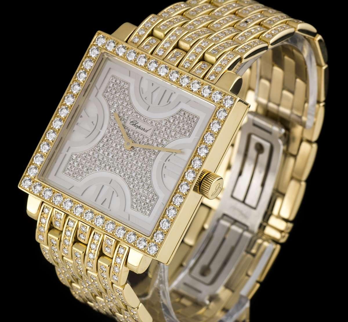 An 18k Yellow Gold Fully Loaded Gents Dress Wristwatch, mother of pearl dial with a pave diamond set centre and applied roman numerals III, VI, IX & XII, a fixed 18k yellow gold bezel set with approximately 48 round brilliant cut diamonds, an 18k