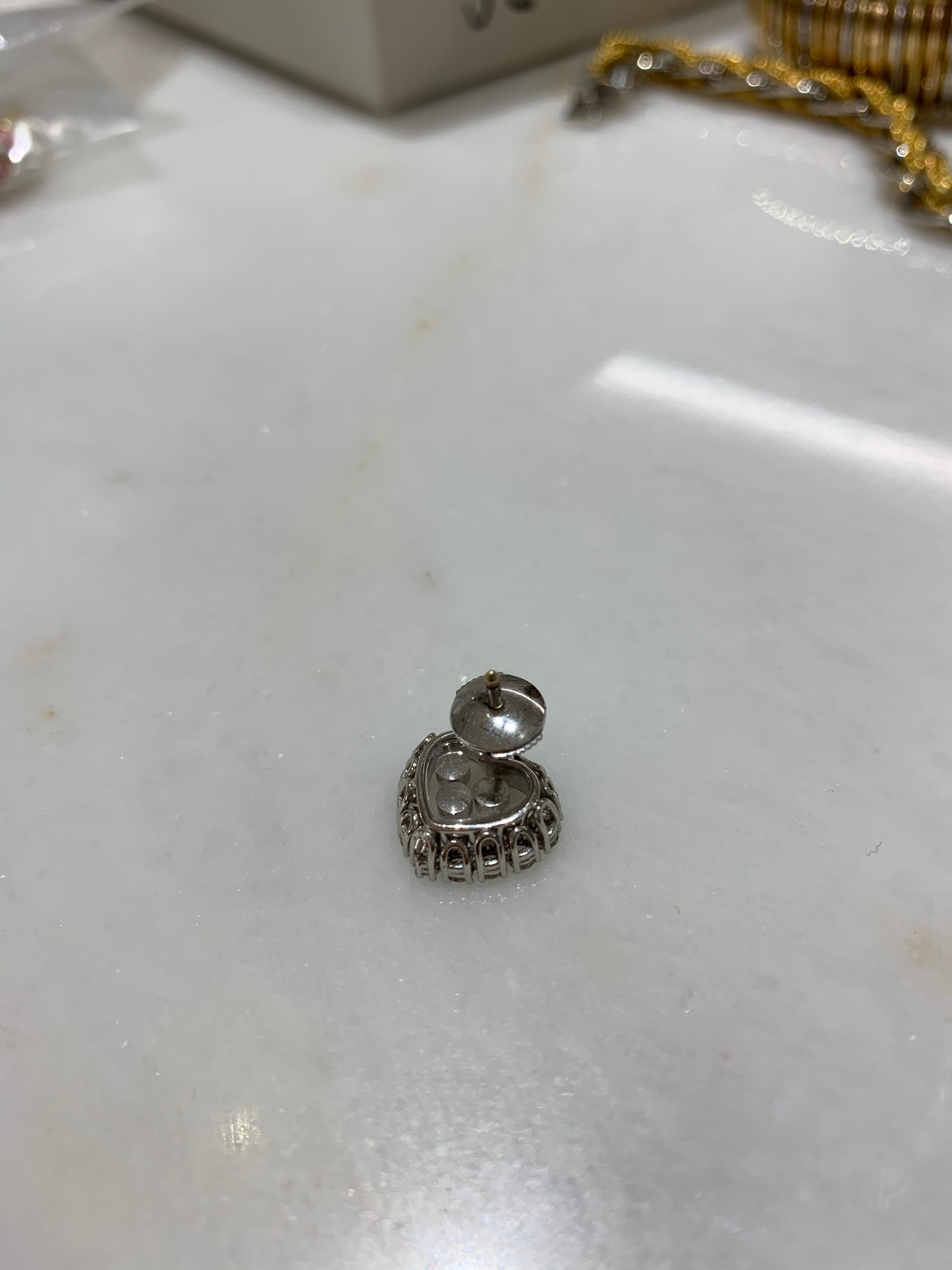 Modern Chopard 18 Karat Gold Happy Diamonds Heart Earrings with 3 Floating Diamonds For Sale