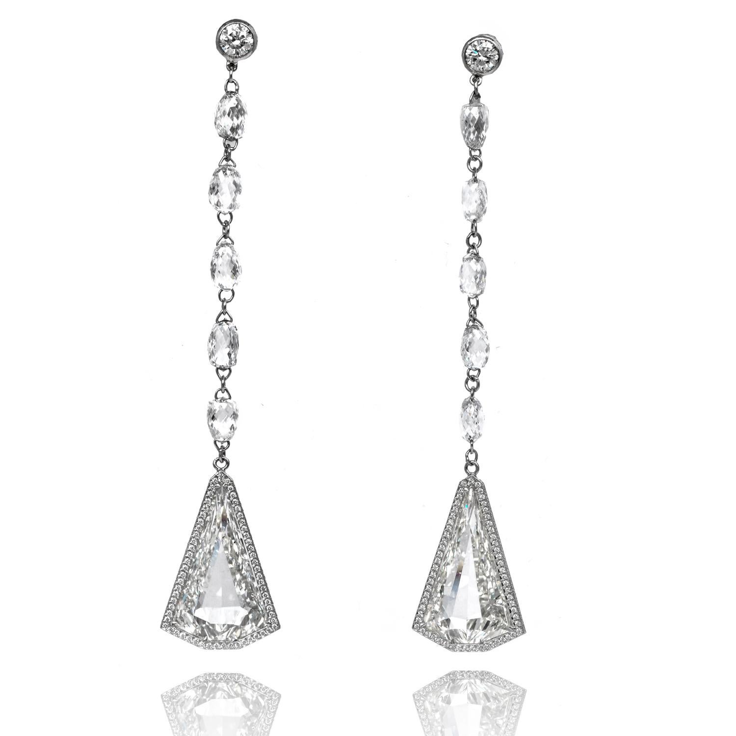 Sparkle elegantly across the room with these breathtaking Diamond 18K Gold Pear Halo Drop Chandelier Chopard Earrings from Copardodissimo Collection.

These earrings present Radiant Heptagon, round brilliant and briolette diamonds bedded in