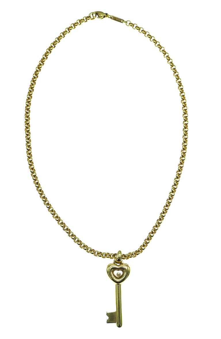 Chopard 18 Carat Yellow Gold Necklace with Diamond Key Pendant at 1stDibs