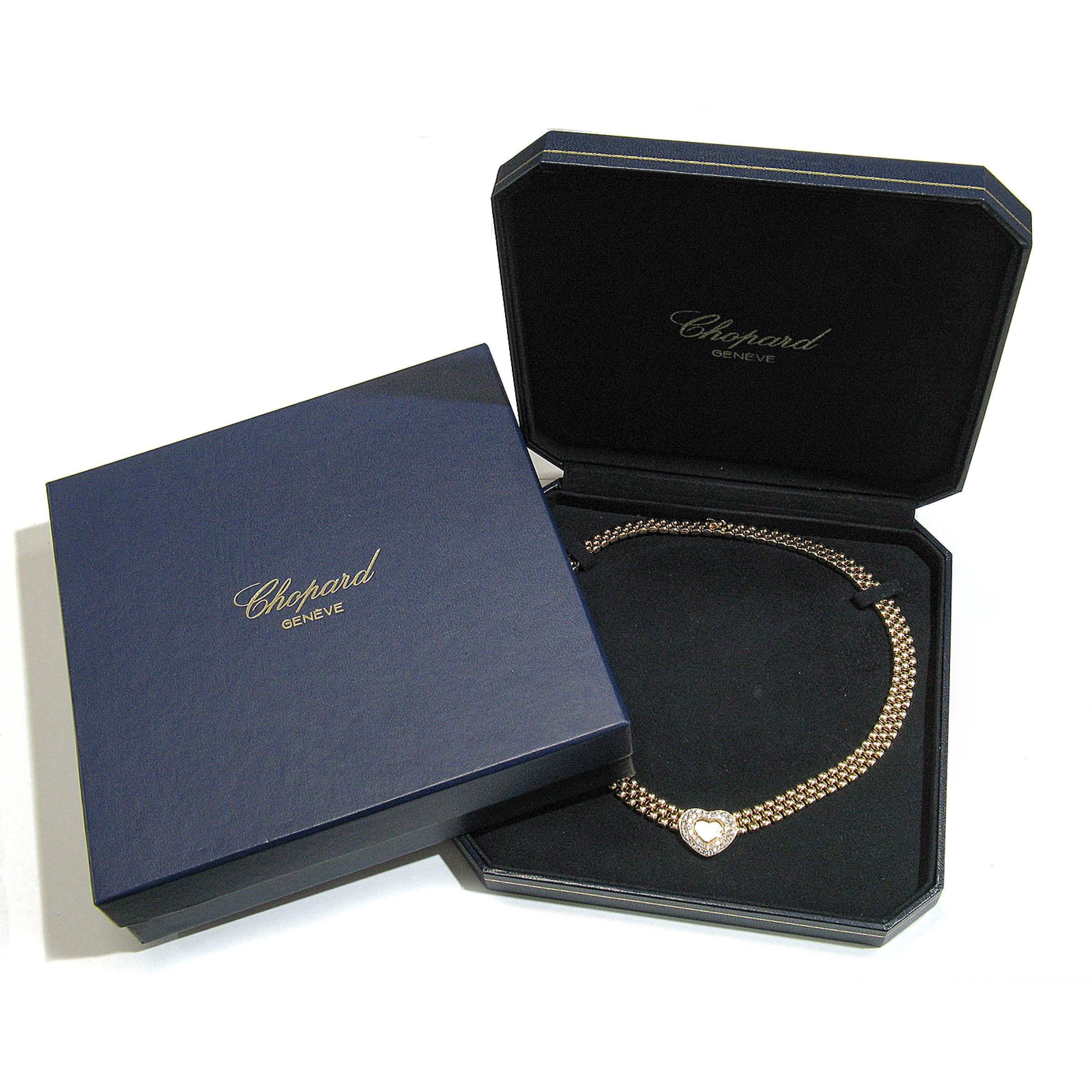 This super elegant and chic luxurious piece from Chopard features their Happy Diamonds statement piece crated in solid 18k gold and featuring approximately 1.25 carats of the finest quality diamonds that are perfectly pave set throughout the heart