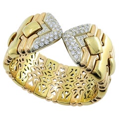 Chopard Brazalete de oro de 18 quilates con pavé flexible de diamantes multicolor, años 70