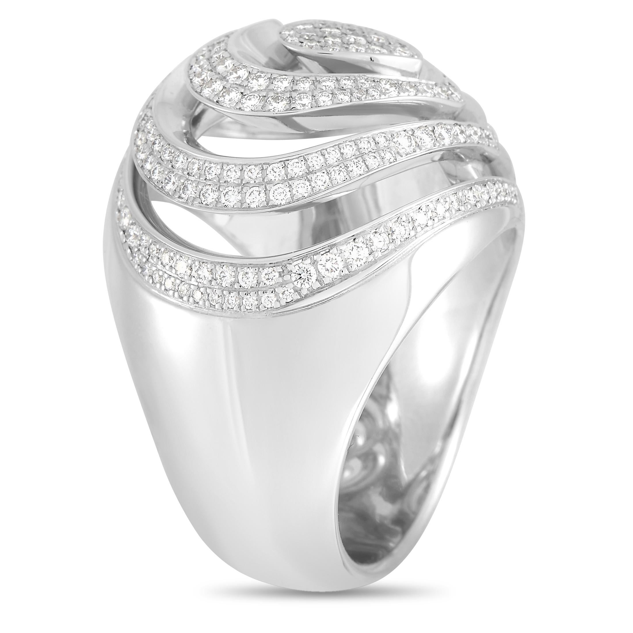 Negative space and a heart-shaped design makes this Chopard ring unlike anything you have seen before. Covered in diamonds totaling 1.17 carats, it features an 8mm wide band and a 12mm top height. Elegant 18K White Gold adds a touch of shimmer to