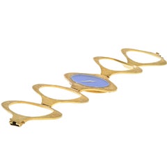 Montre-bracelet Chopard en or jaune 18 carats, finition écorce, cadran en lapis, années 1970