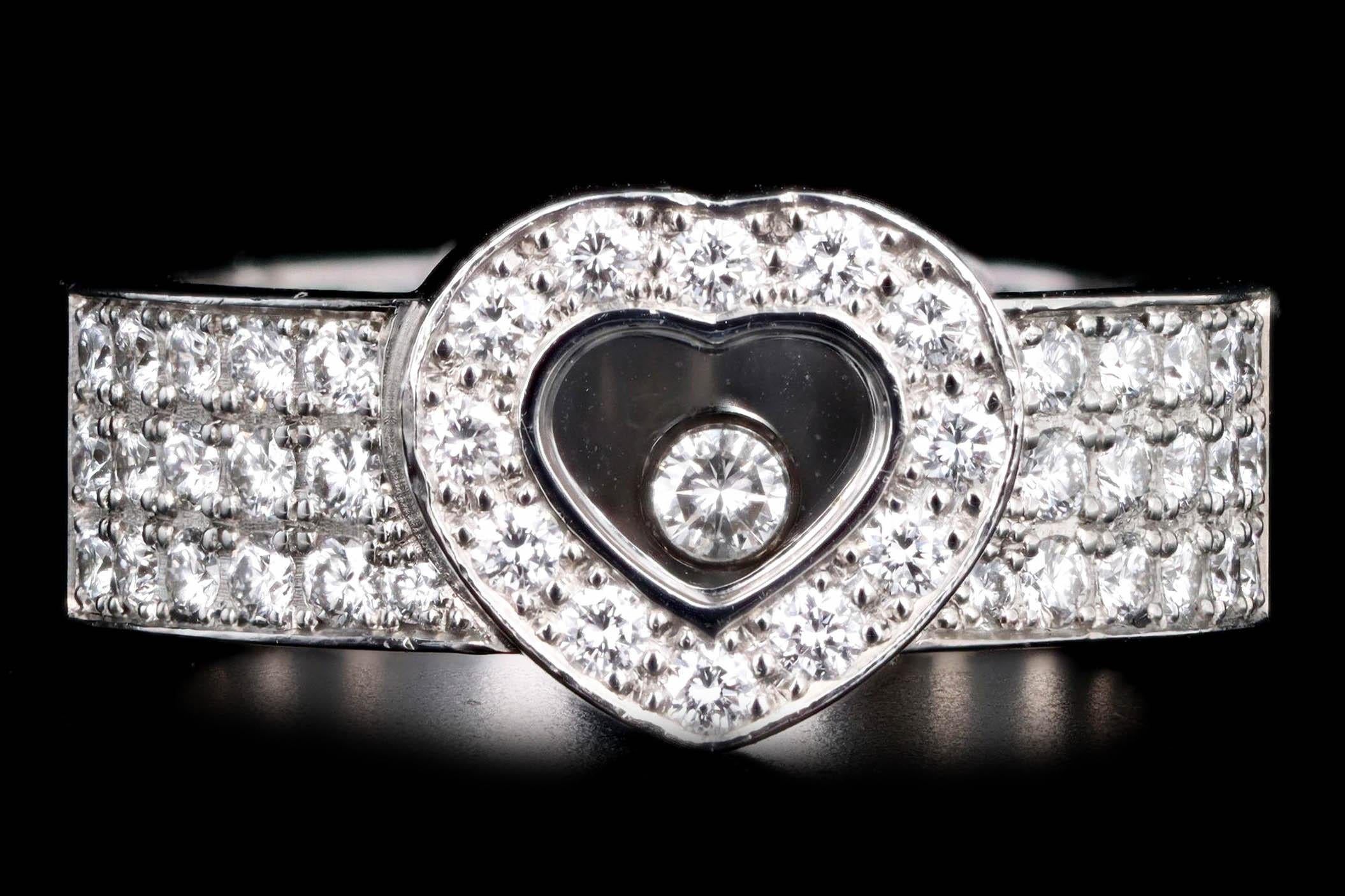 Era: Modern

Designer: Chopard

Composition: 18K White Gold

Primary Stone: Forty Three Round Brilliant Cut Diamonds

Total Carat Weight: Approximately 0.75 Carats

Color/Clarity: G-H / VS1-2

Ring Size: 6.25

Ring Weight: 12.4 Grams

Item Barcode: