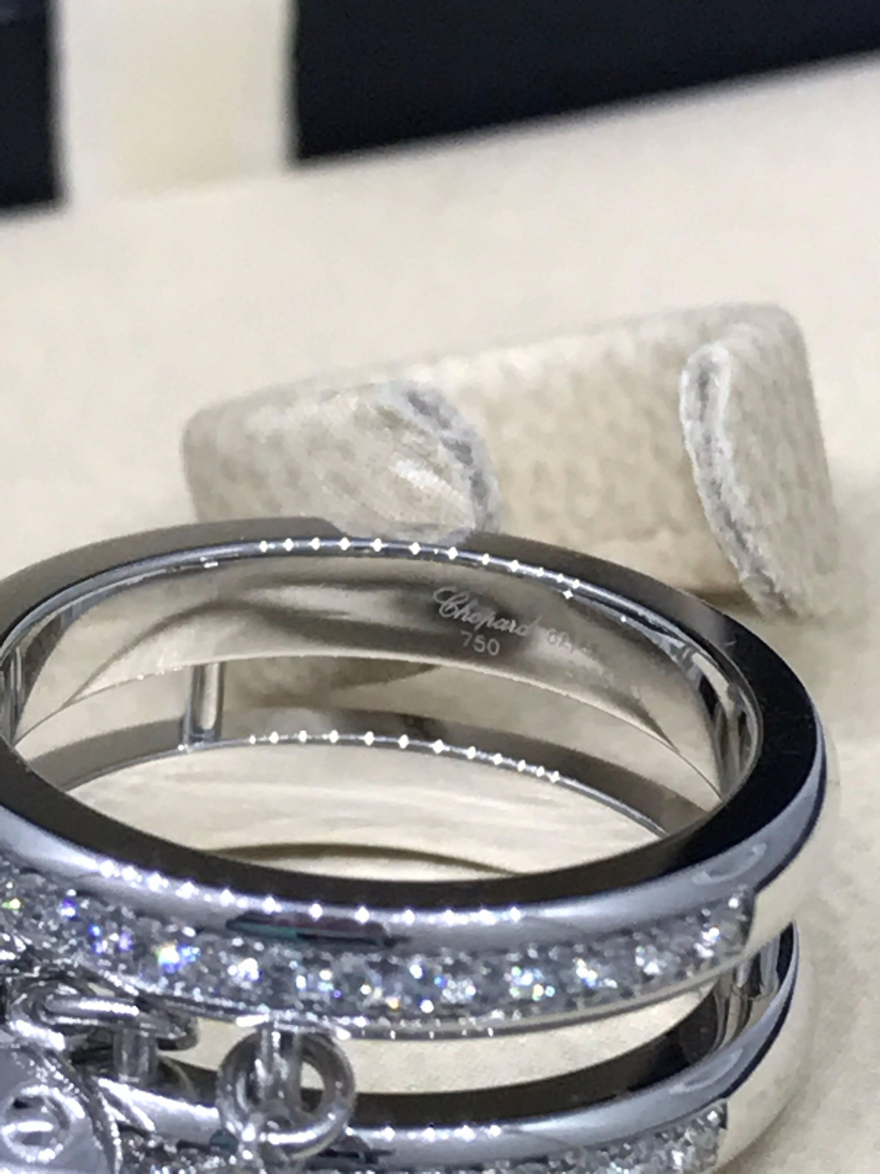Chopard 18 Karat White Gold Rubies Sapphires and Diamonds Fish Ring In New Condition In New York, NY