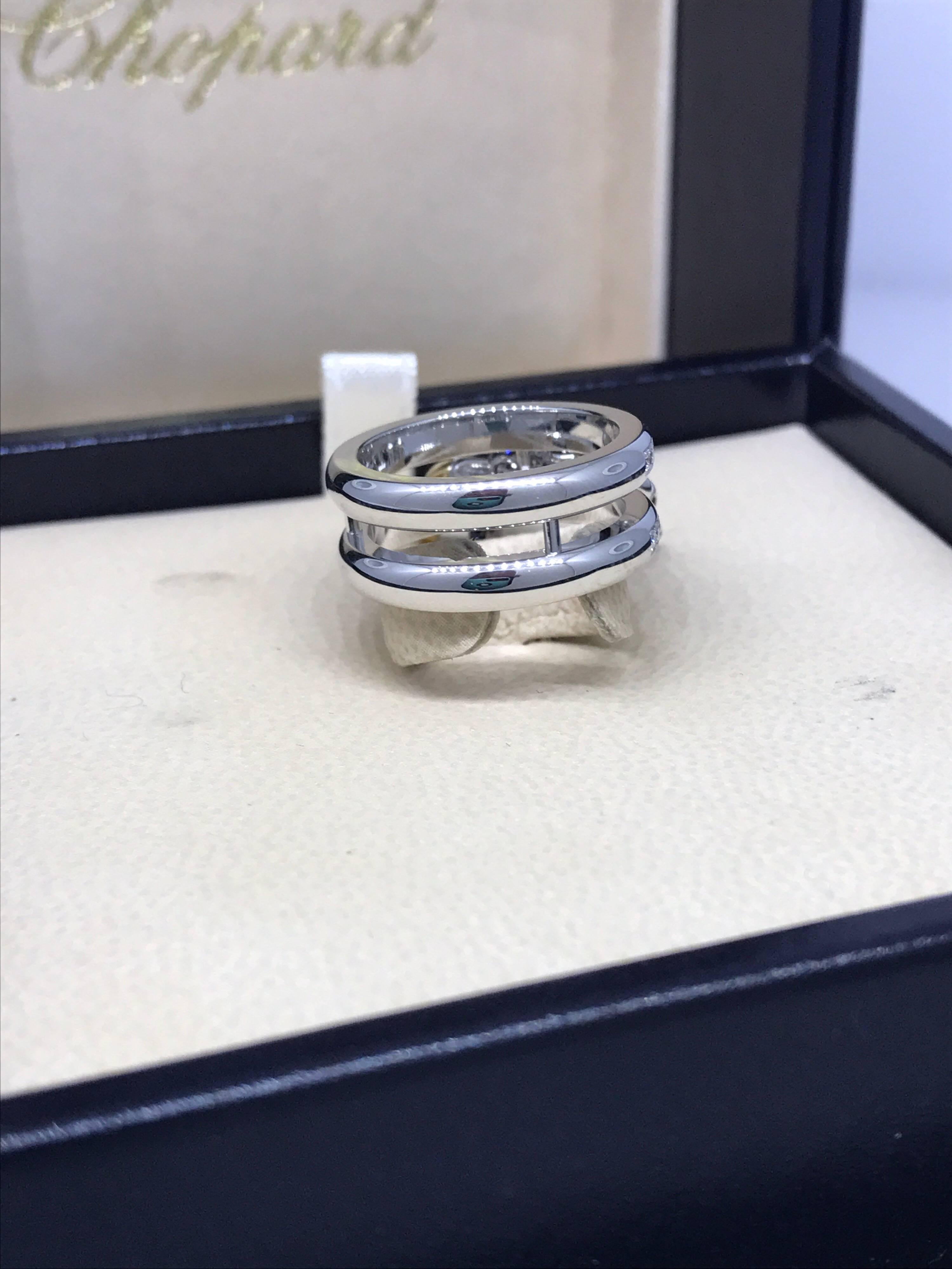 Chopard 18 Karat White Gold Rubies Sapphires and Diamonds Fish Ring 1