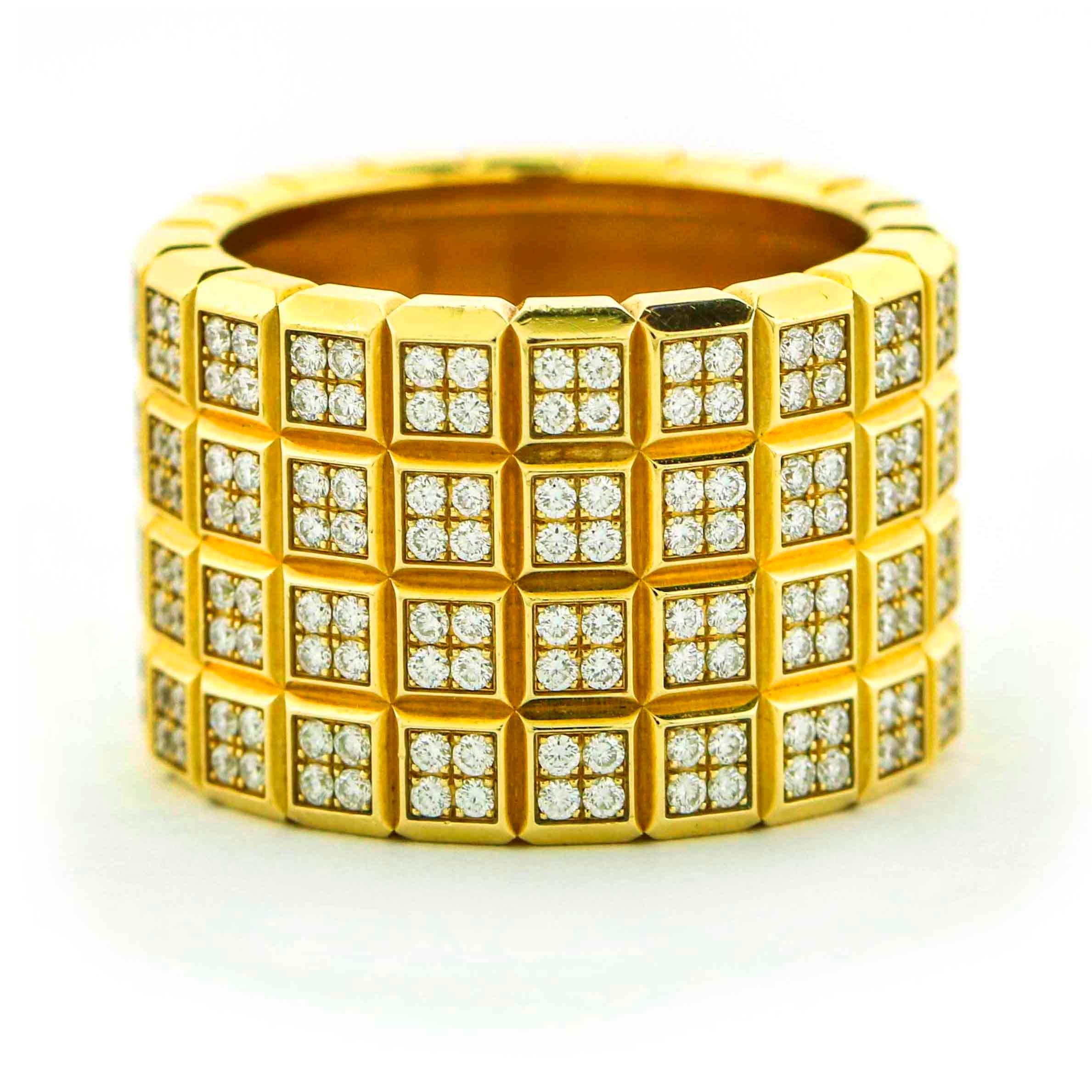 Chopard diamond Ice Cube band in 18 karat yellow gold. The ring has 4 rows of diamonds. 

Size, 7.5
Diamond total carat weight, 1.60 carats.