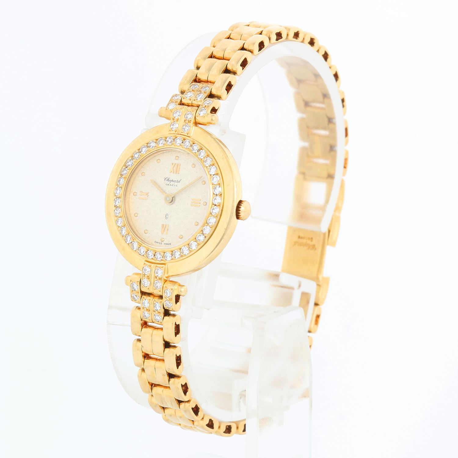 Chopard 18k Yellow Gold Diamond Ladies Watch 887/1 - Quartz. 18k yellow gold case with diamond bezel with diamond lugs; set with 60 diamonds  (23mm diameter). Special stone dial. 18K Yellow gold bracelet, measuring 6 1/4 inch wrist. Pre-owned with