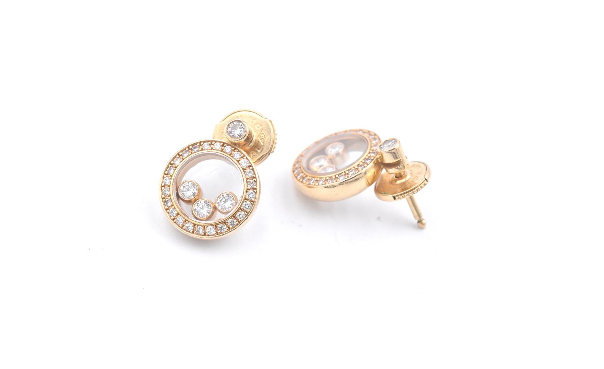 Designer: Chopard
Material: 18k yellow gold
Diamonds: 56 round brilliant cuts = 0.75 cttw
Color: G
Clarity: VS
Dimensions: the earring measures 14.45mm X 11.45mm
Weight: 6.95 grams

