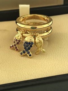 Chopard 18 Karat Yellow Gold Rubies and Sapphires Fish Ring
